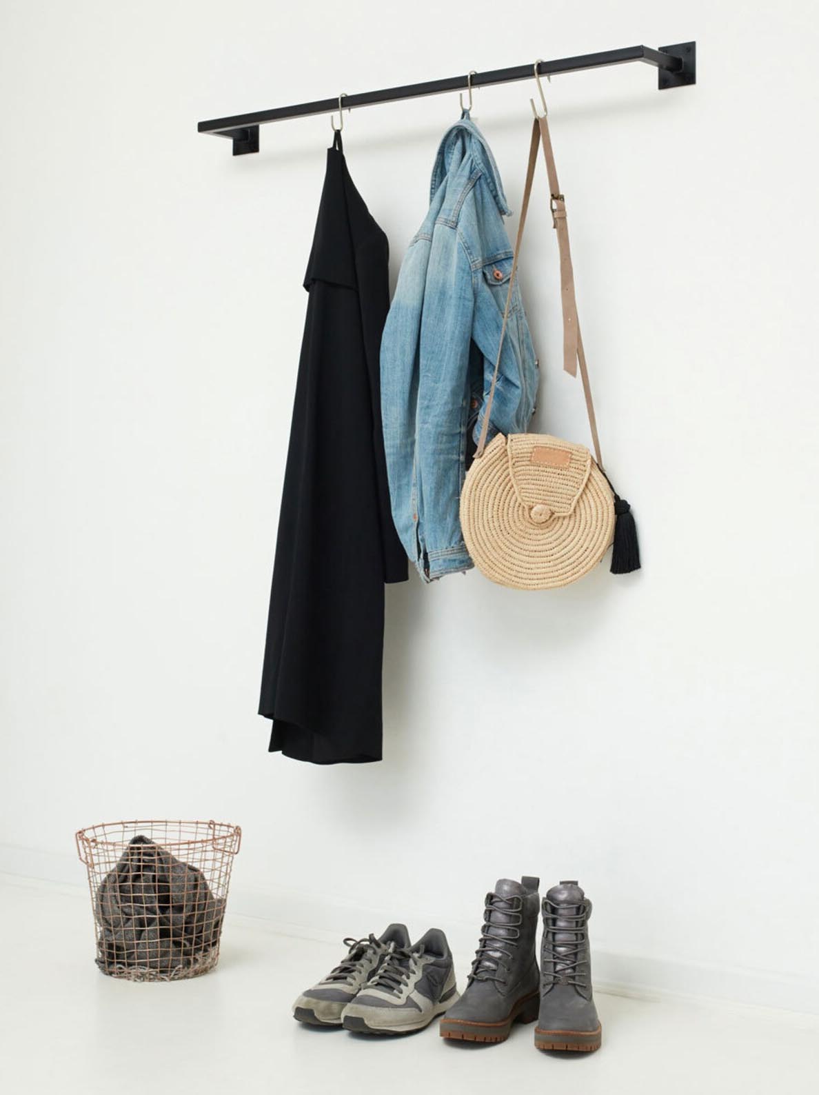 Storage Idea - Modern wall mounted black clothes rack.