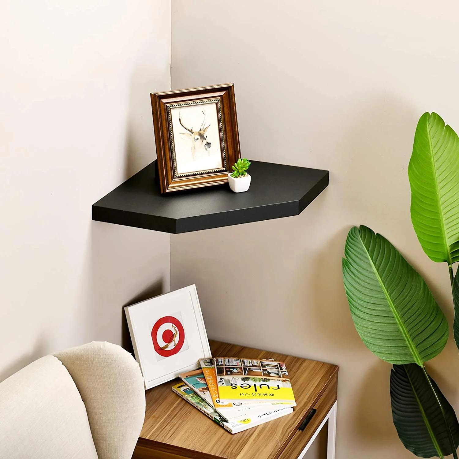 Corner Shelf Ideas - A minimalist floating black corner shelf.