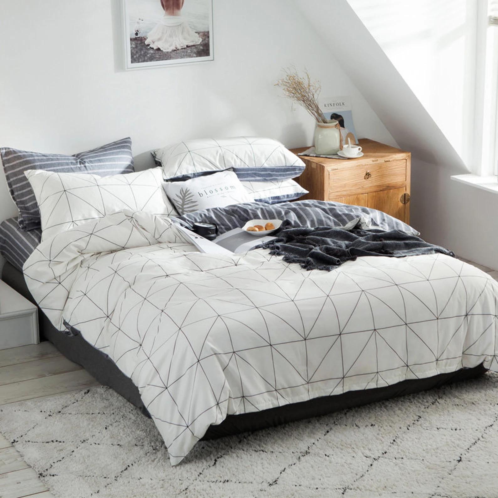 Modern Bedroom Decor - Minimalist geometric bedding.