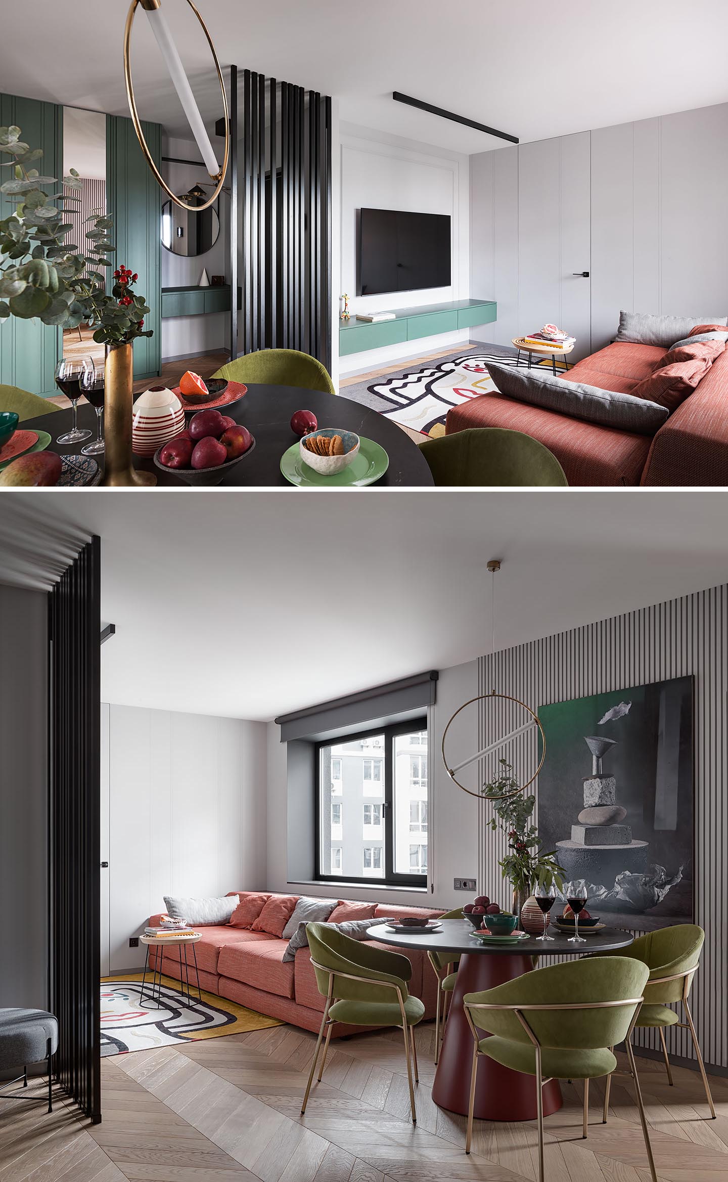 In the living room, a black vertical slat partition creates a separation between the entryway and the living space, where there's a large and colorful couch that faces the television.