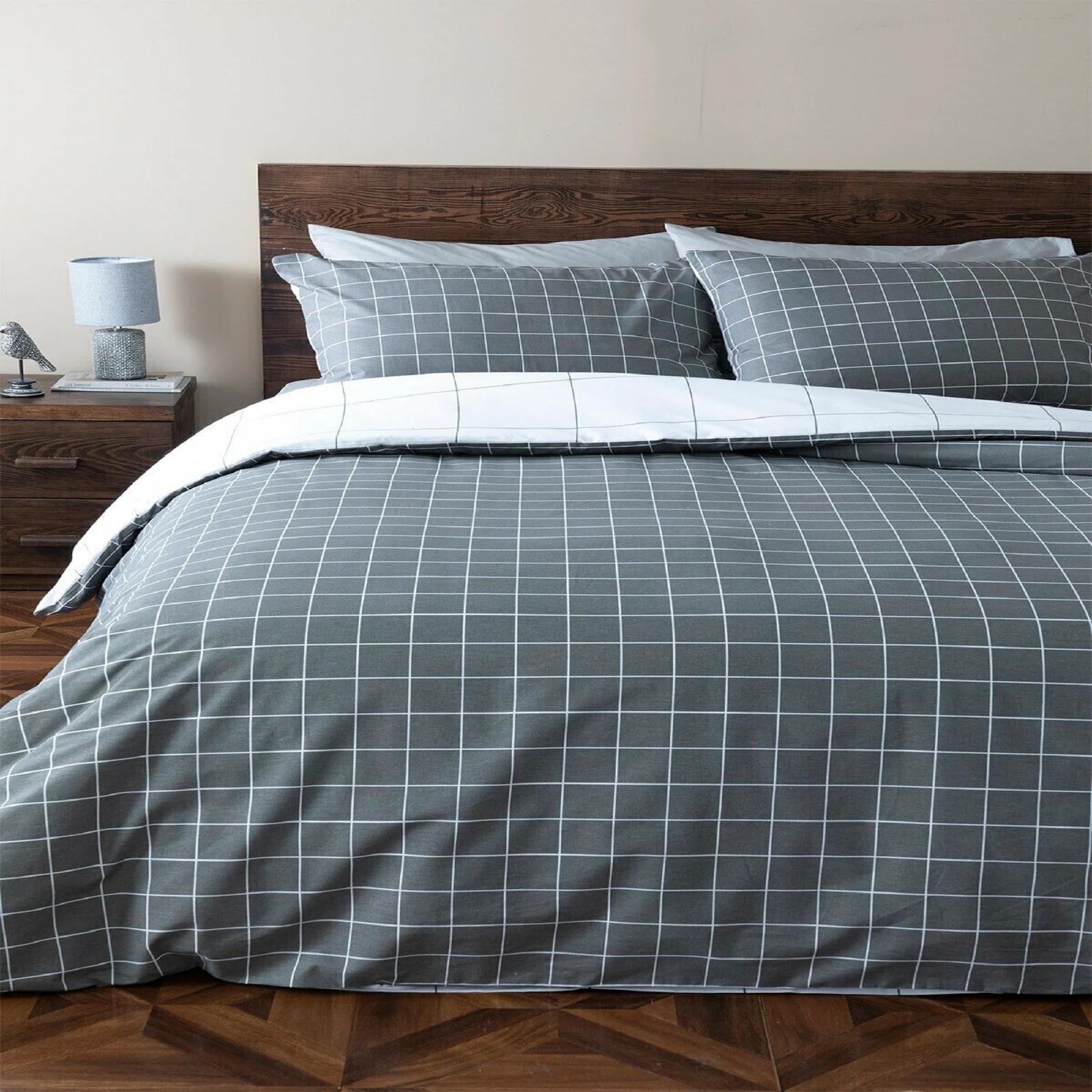 Modern Bedroom Decor - Grey and white geometric bedding.