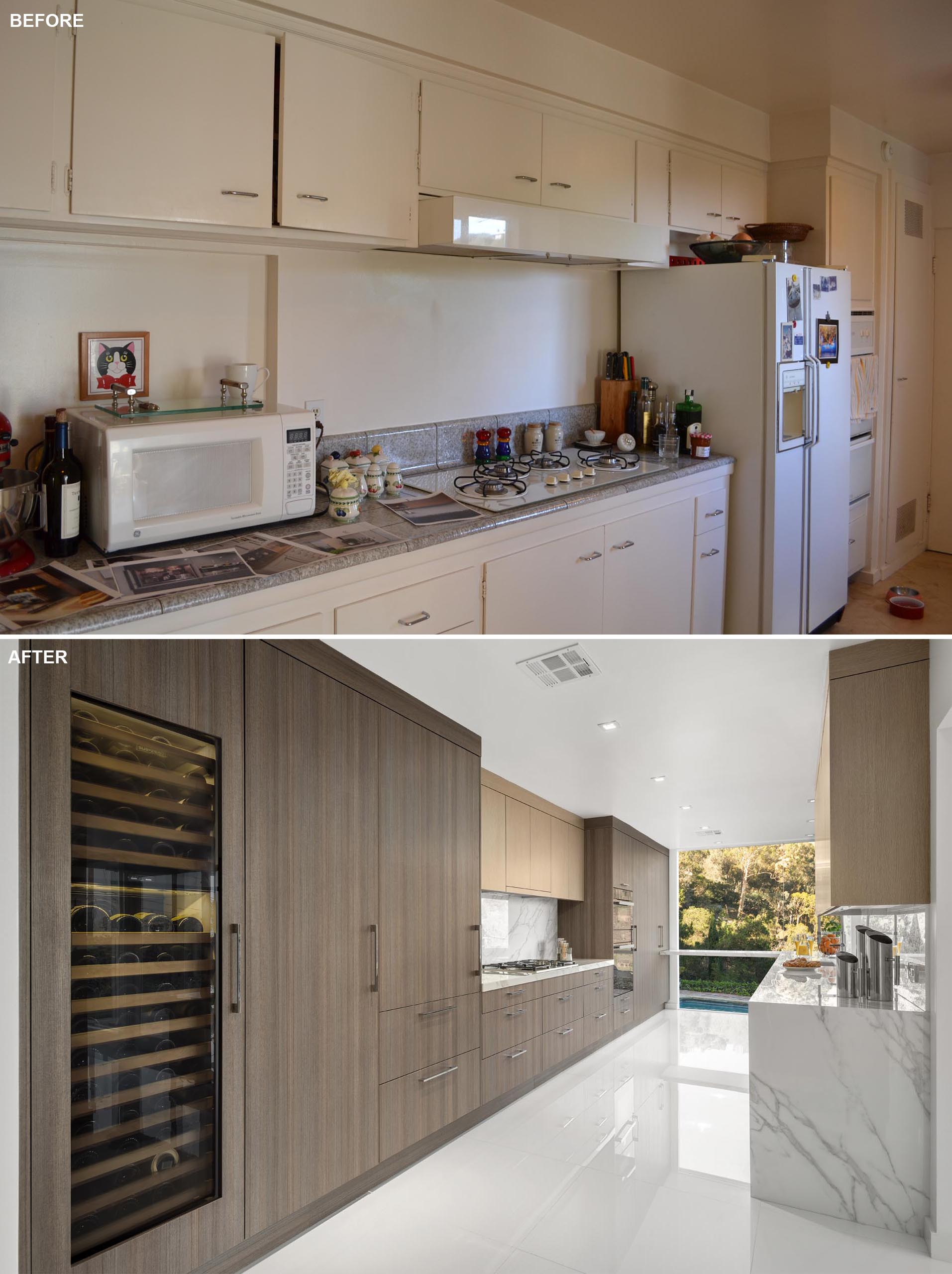 This updated kitchen includes a wall of floor-to-ceiling cabinetry that integrates the fridge and a wine refrigerator.