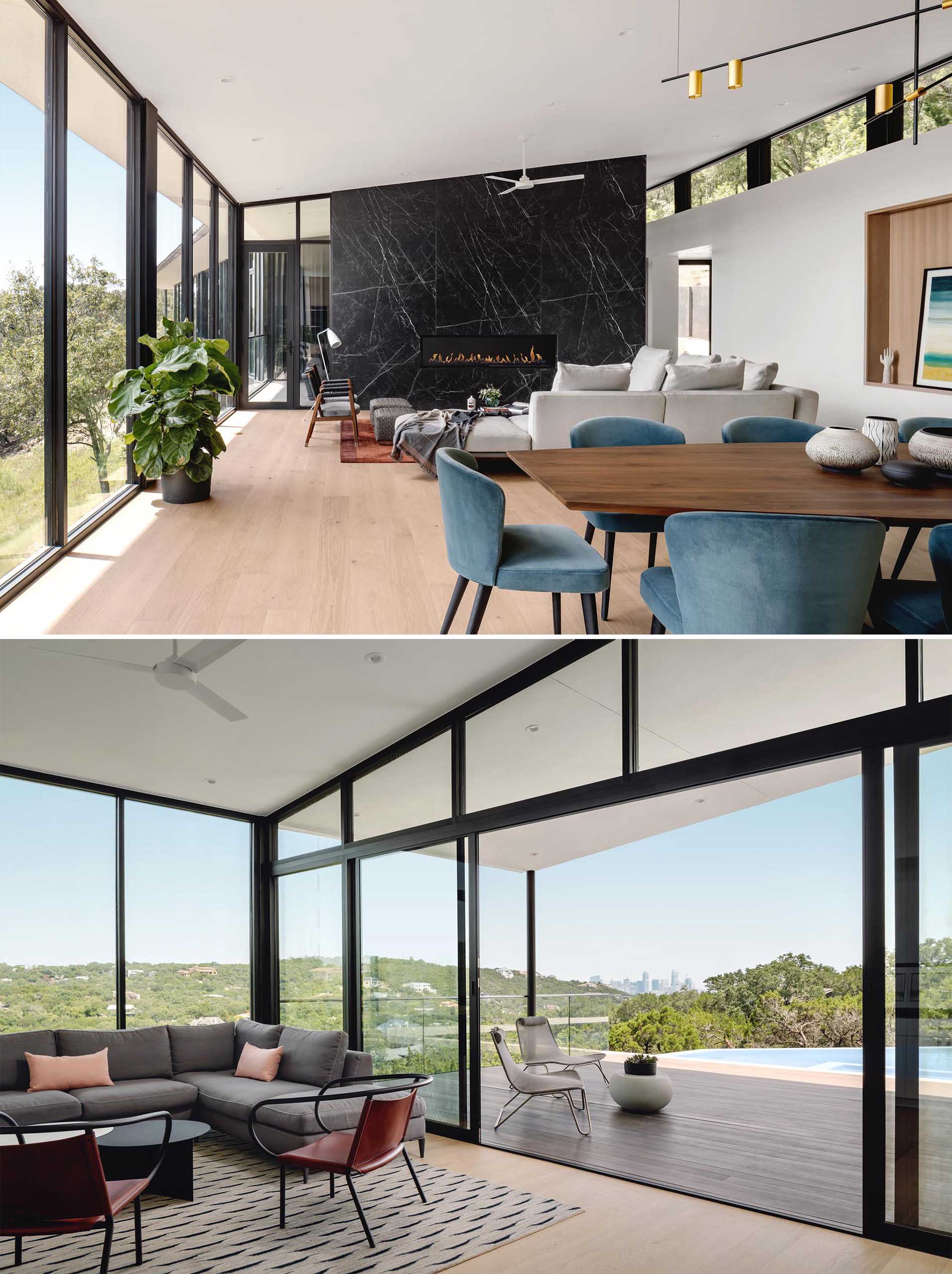 Inside this modern home, the living areas are open plan with the main living room, dining area, and kitchen all sharing the space, while a secondary living space is located by the pool and opens to a covered patio.