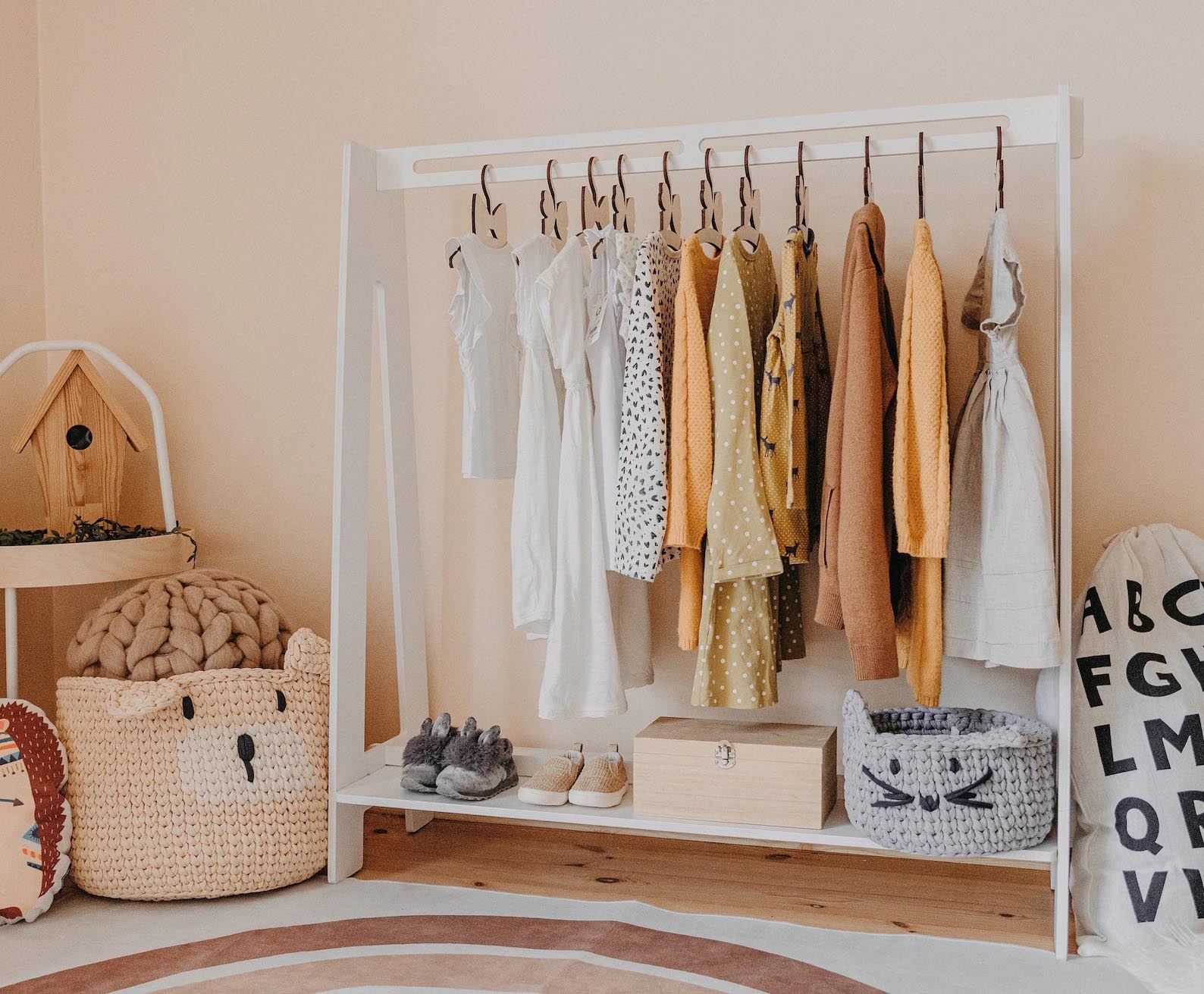 Storage Idea - Modern kid's white freestanding clothes rack.