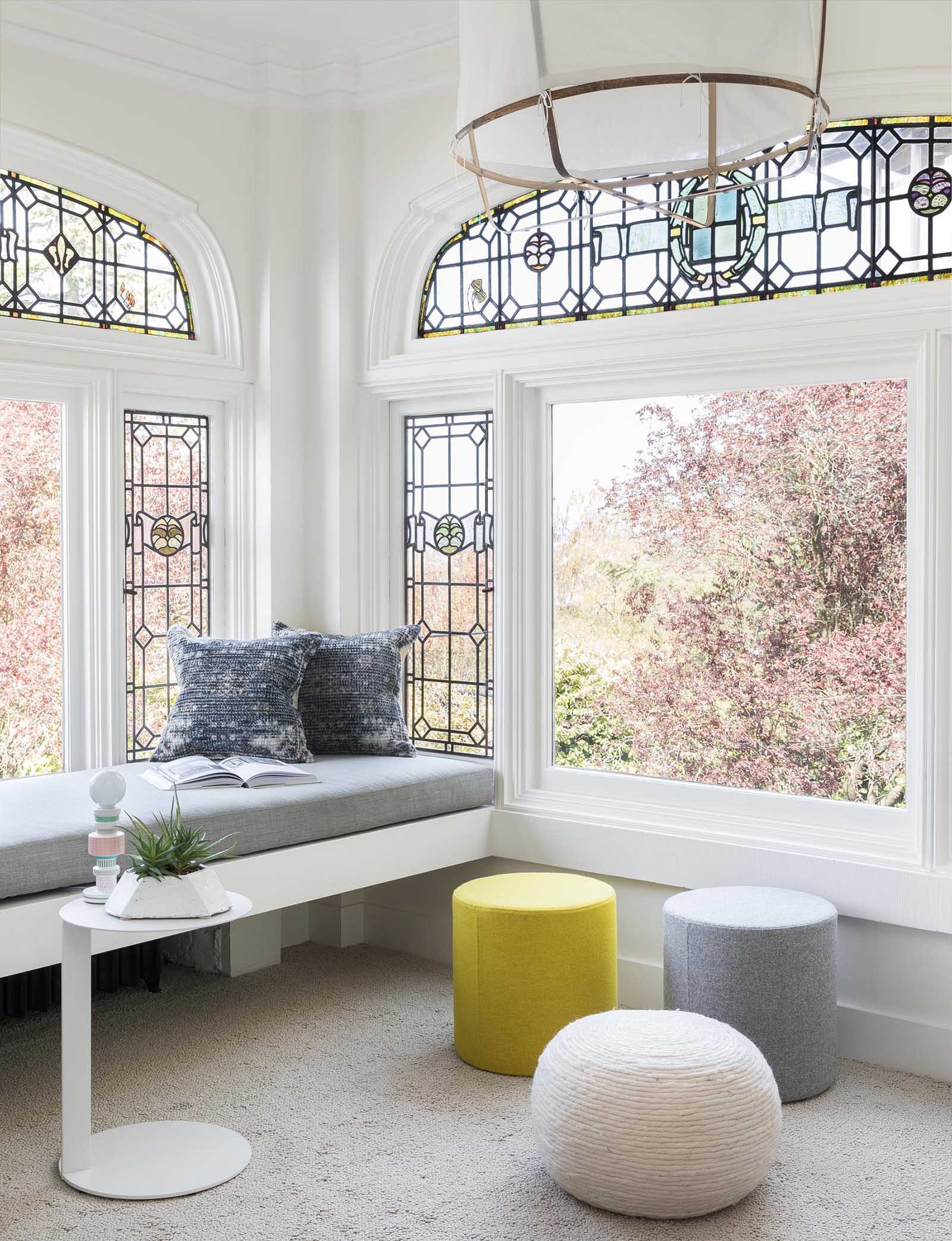 A built-in window bench adds seating and takes advantage of the garden views.