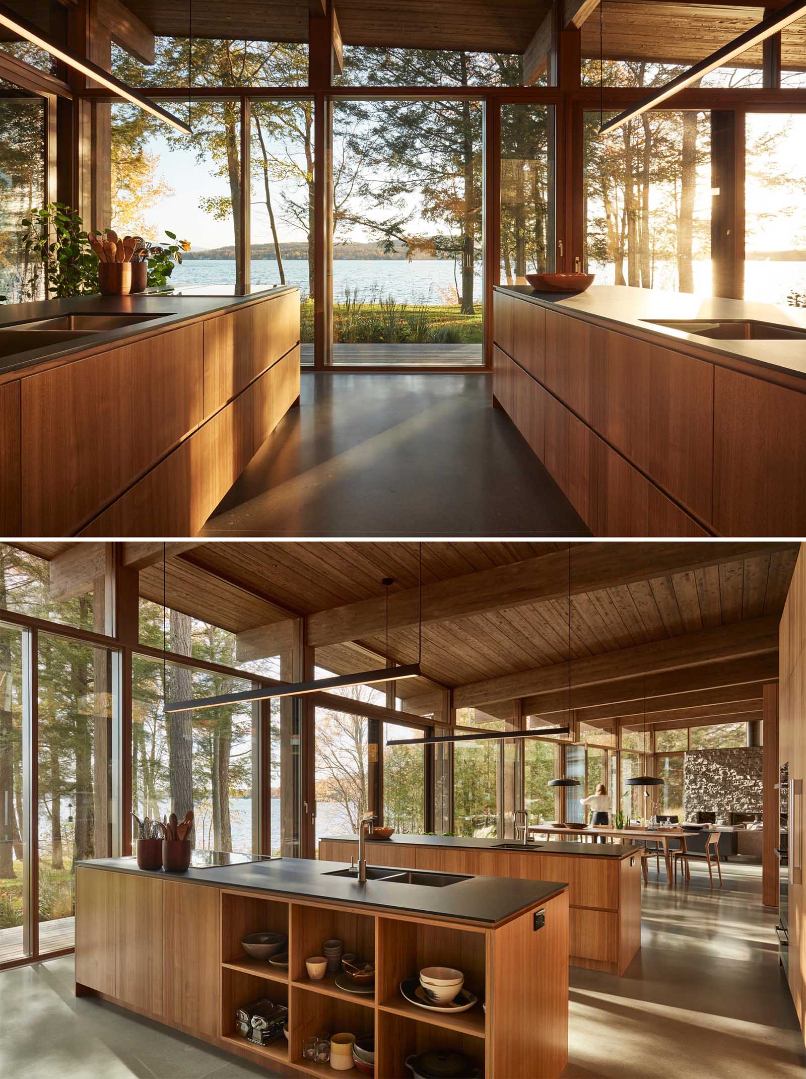 This modern kitchen with two islands also includes flat paneled walnut cabinetry, open shelving, black Fenix NTM countertops, and concrete flooring.