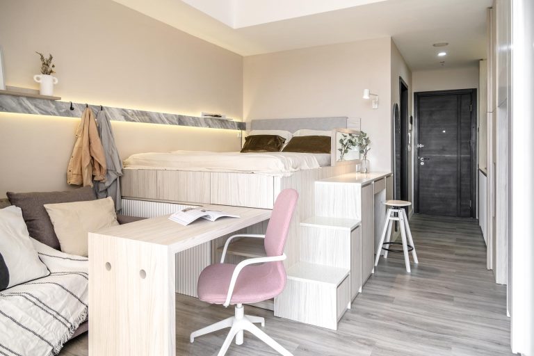 The Loft Bed In This Small Apartment Was Designed With Storage And A Home Office