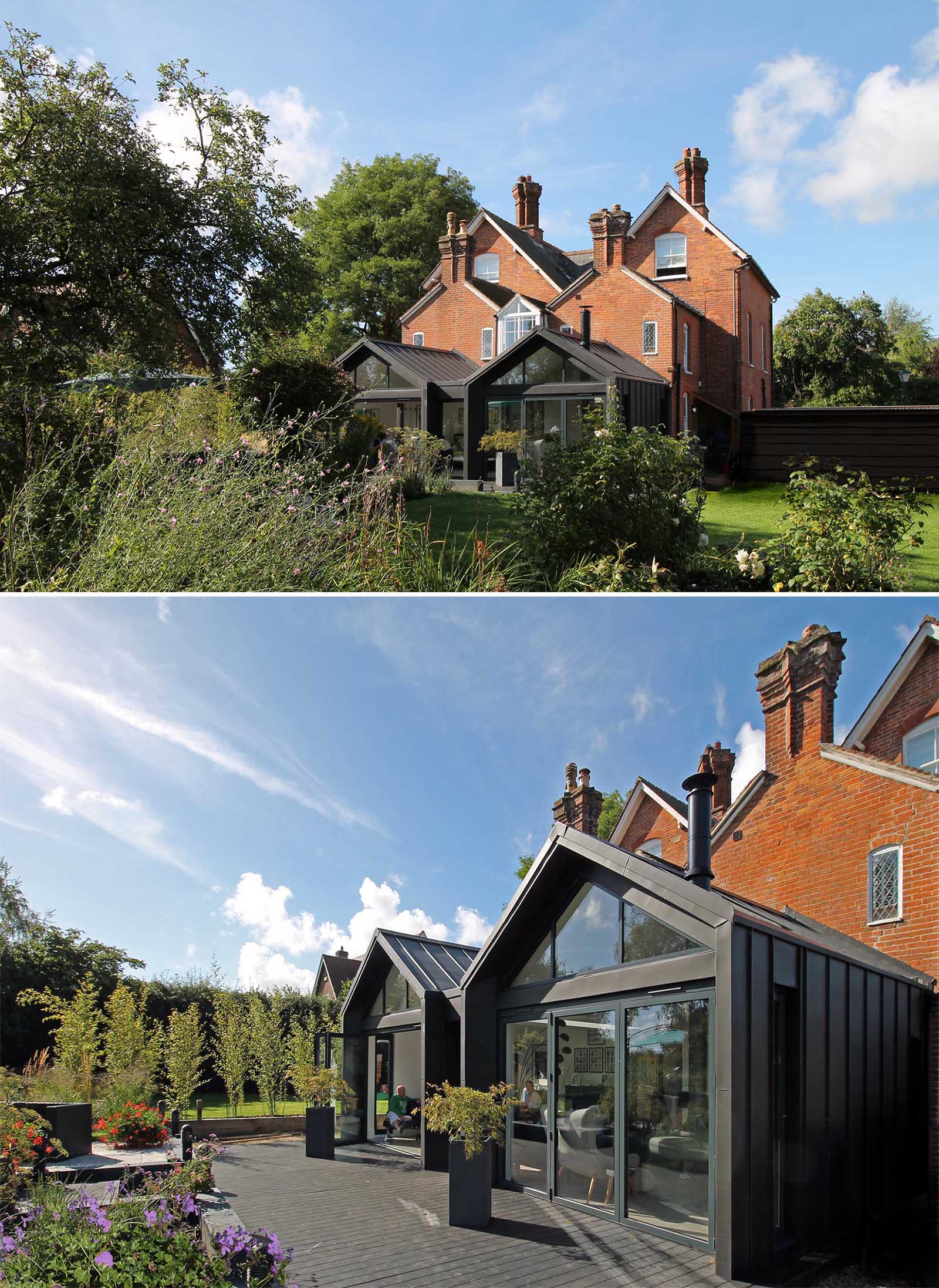A modern extension with pitched roofs and black in black zinc.