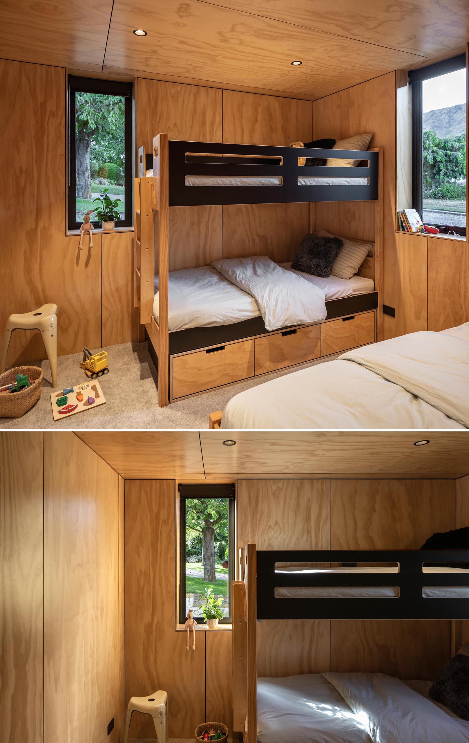 A modern kids bedroom with wood walls and ceiling, and a bunk bed.