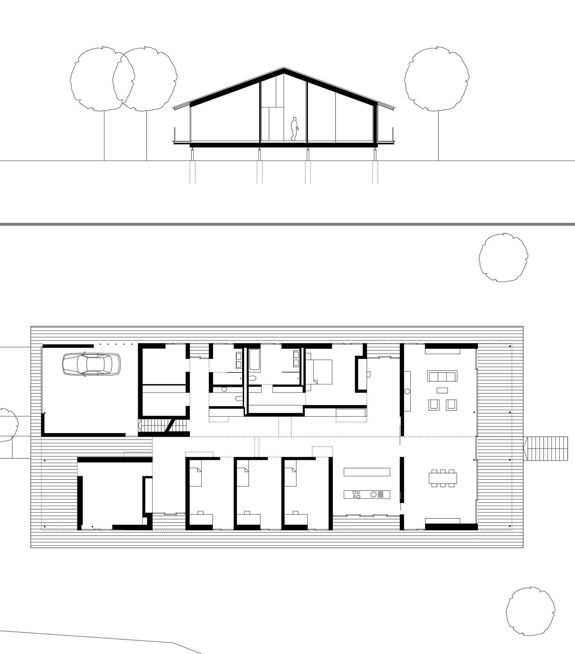 A modern wood house on stilts.