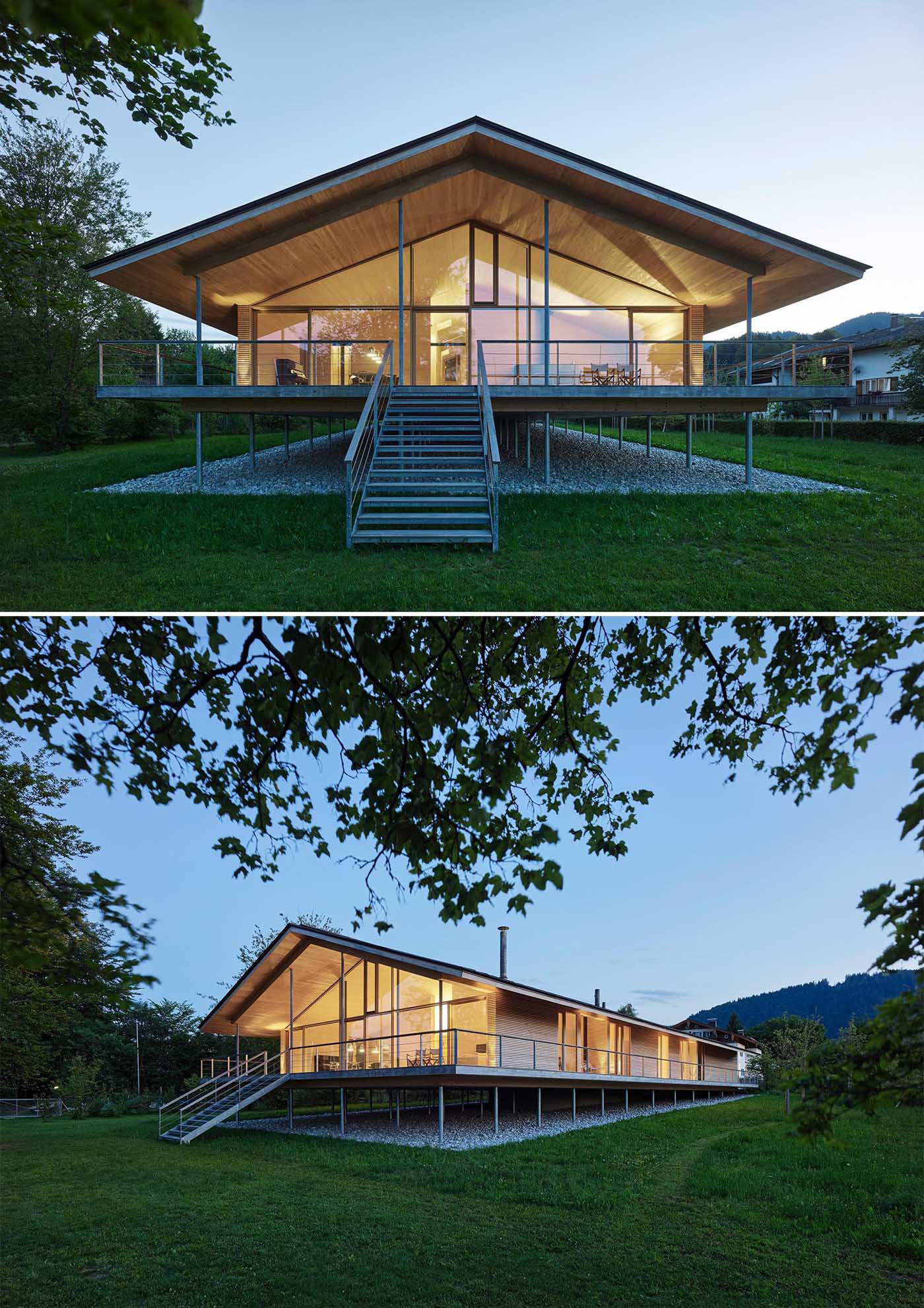 The timber construction of this modern house was mostly made from local woods, and is elevated on stilts to protect it from flood.