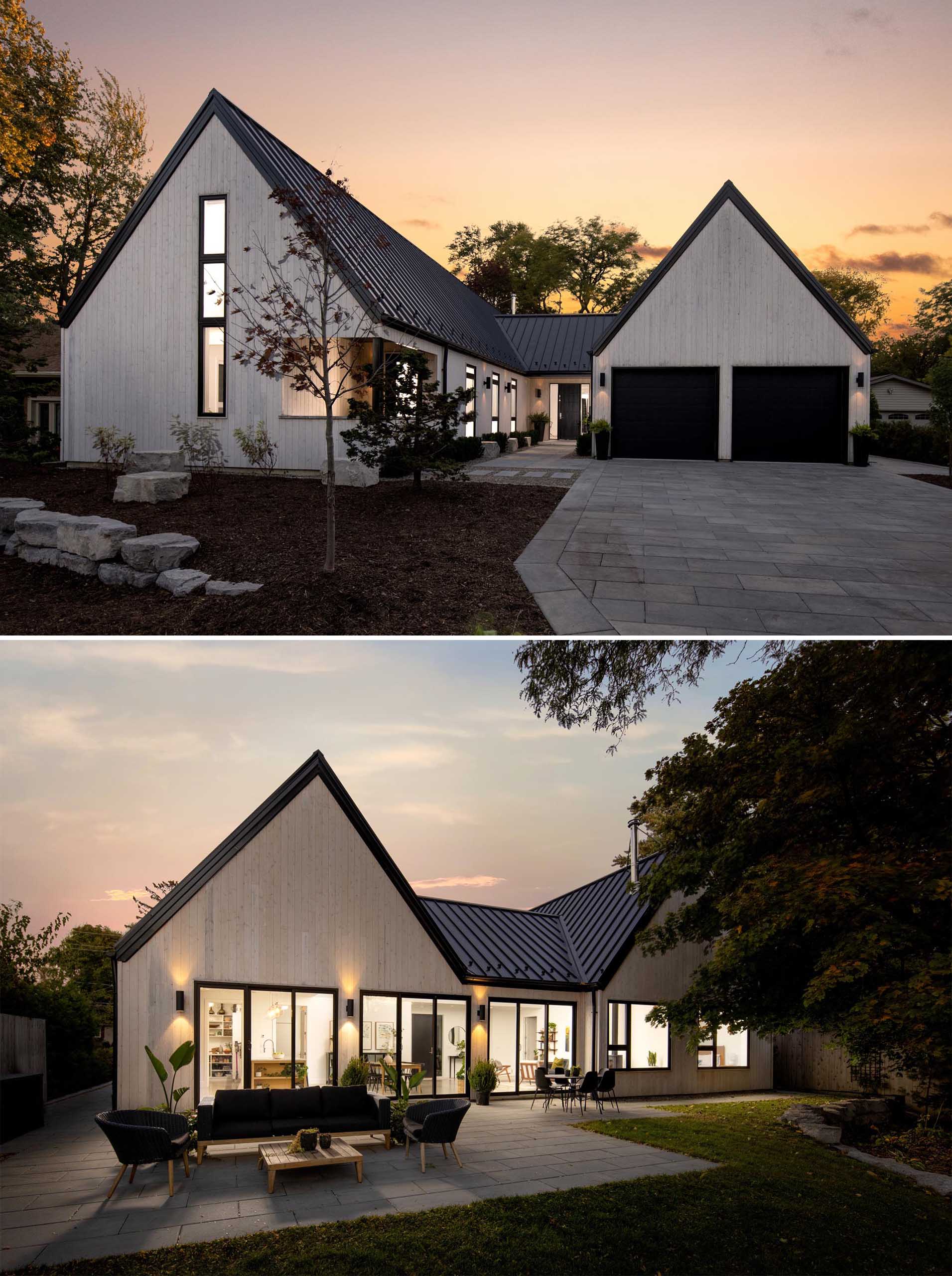 The exterior finishes of this Scandinavian inspired home includes vertical white cedar siding and standing seam metal roofs.