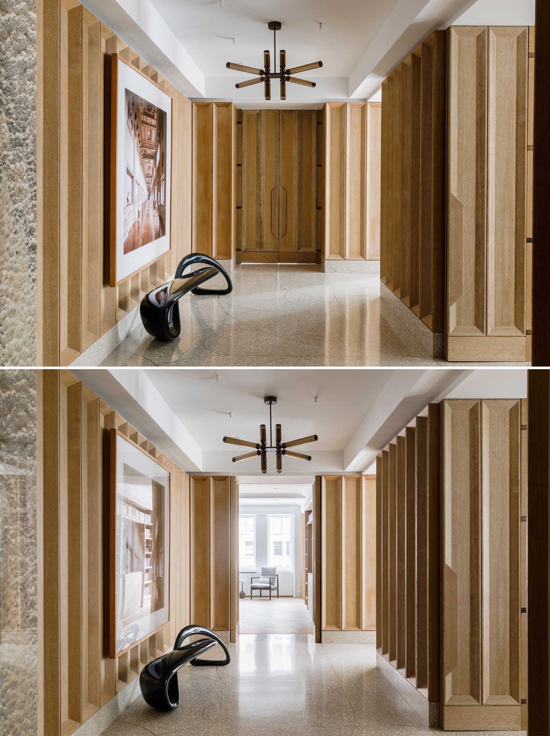 This entryway and gallery includes deep coffered paneling in cerused white oak, custom terrazzo floor with hand bent brass inlay, two “Castle” pendants by Jason Miller for Roll and Hill, photo artwork by Candida Hofer, and a fiberglass bench by Brodie Neill.