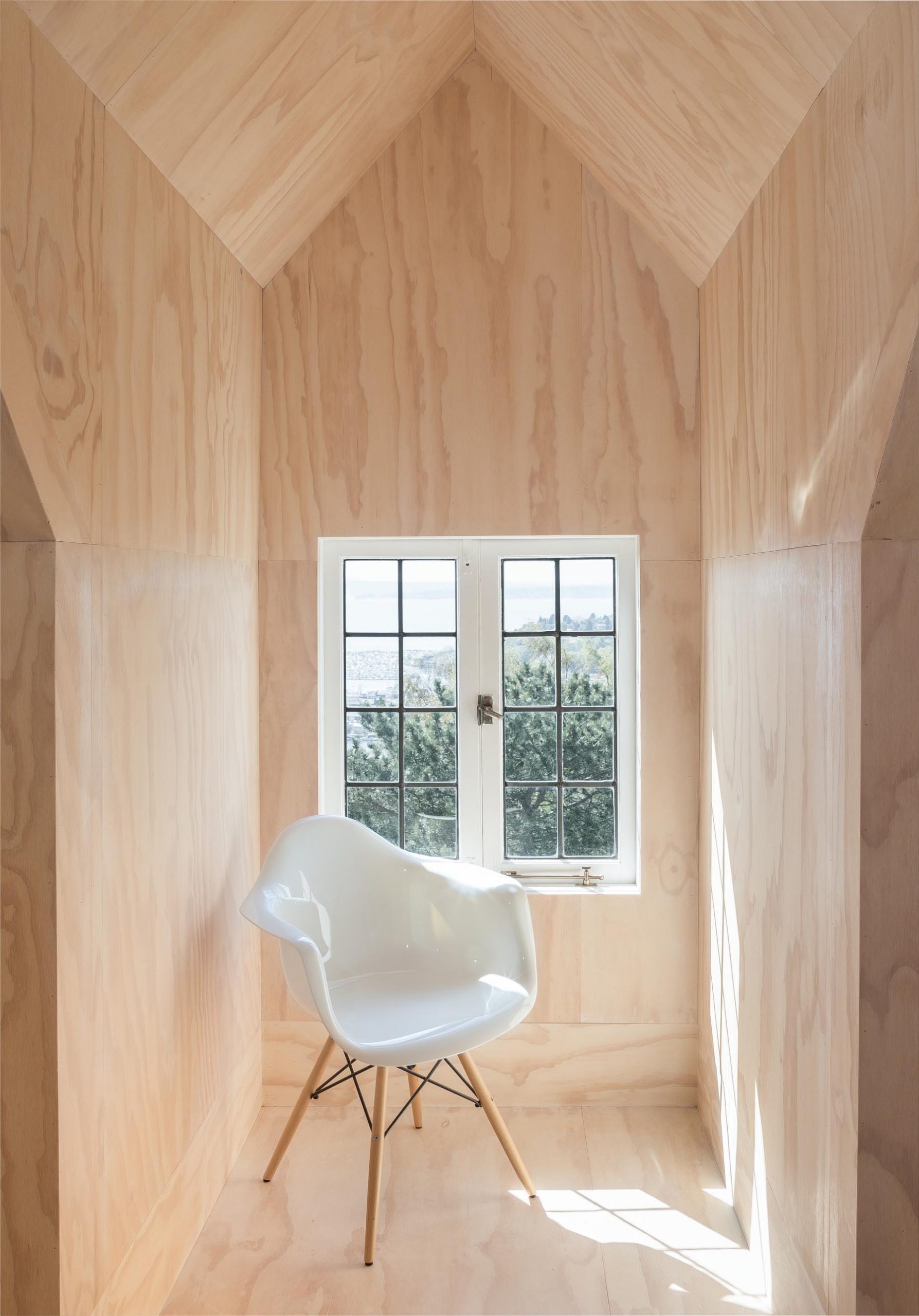 A plywood lined seating alcove.