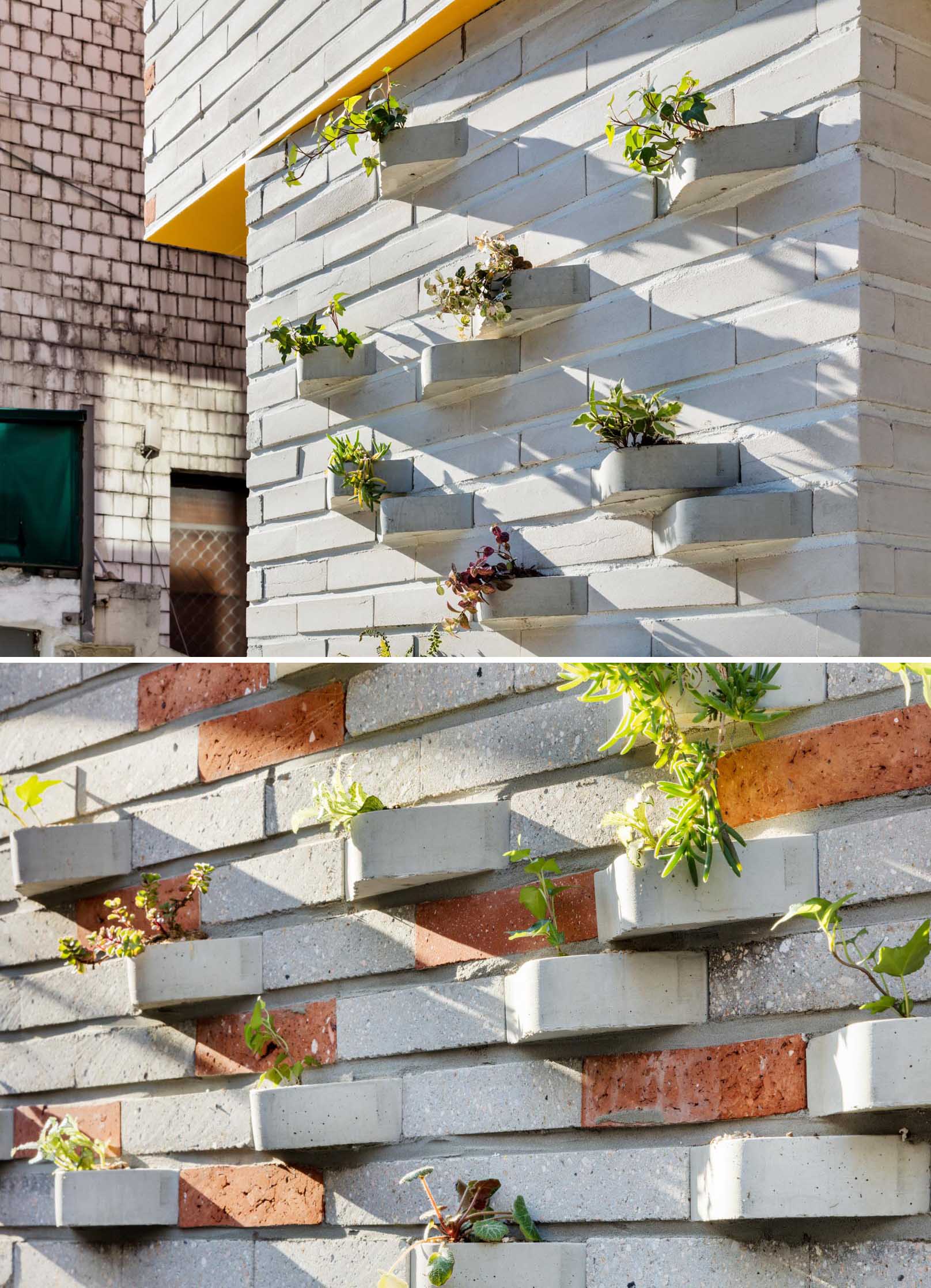 A modern brick building with incorporated plants into the facade.