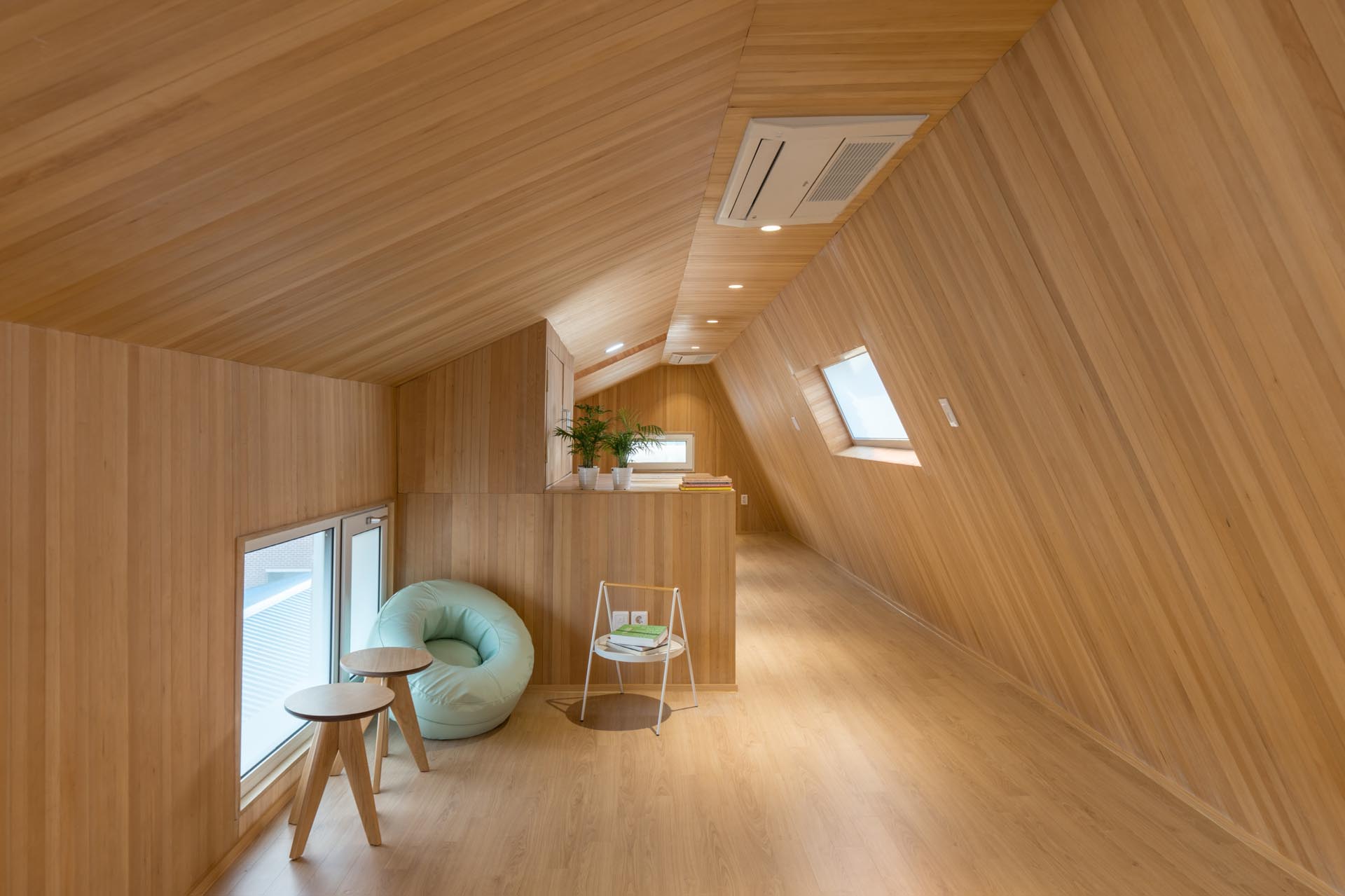 A modern wood-lined apartment interior.