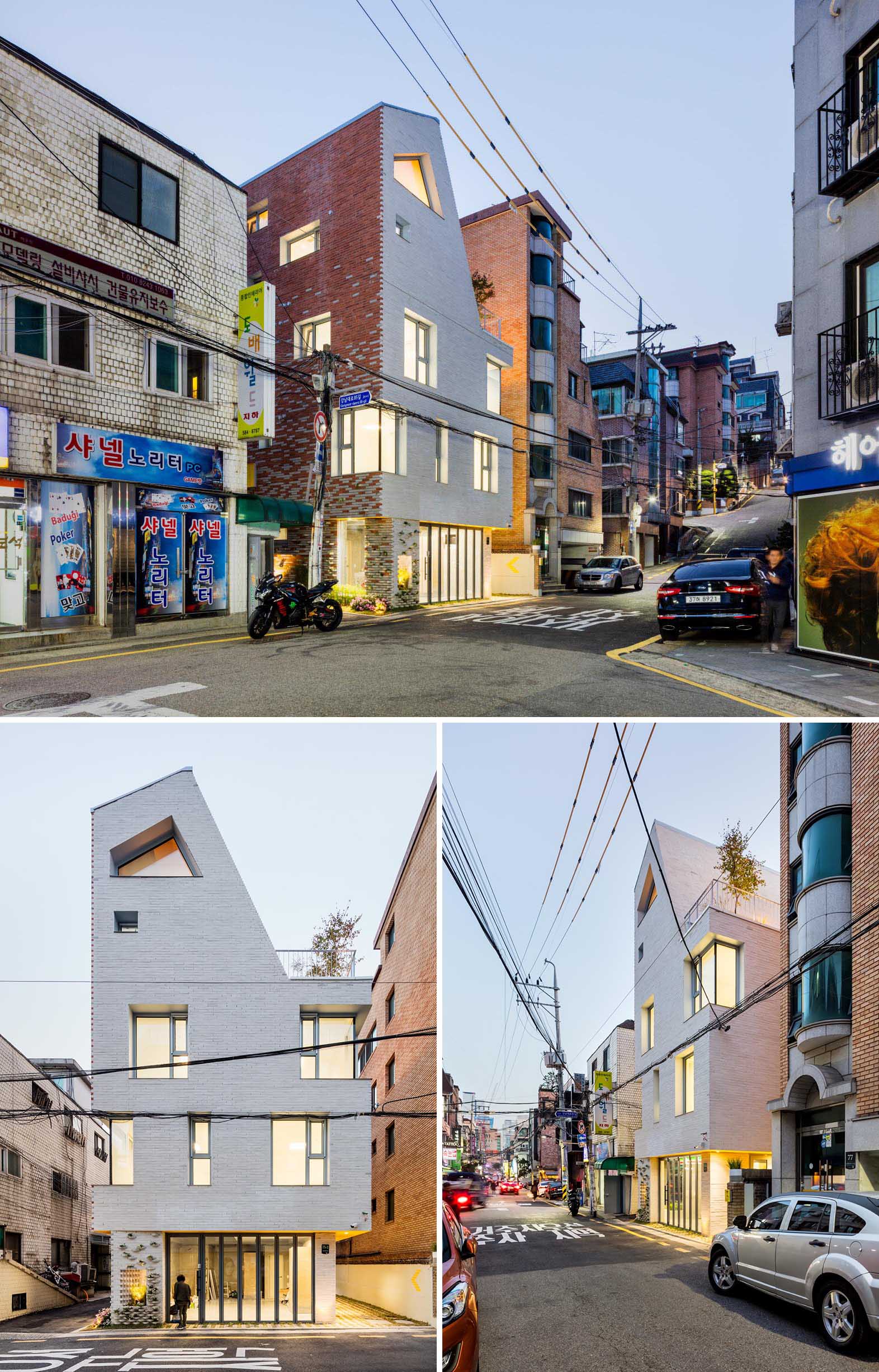 A modern brick building with incorporated plants into the facade.