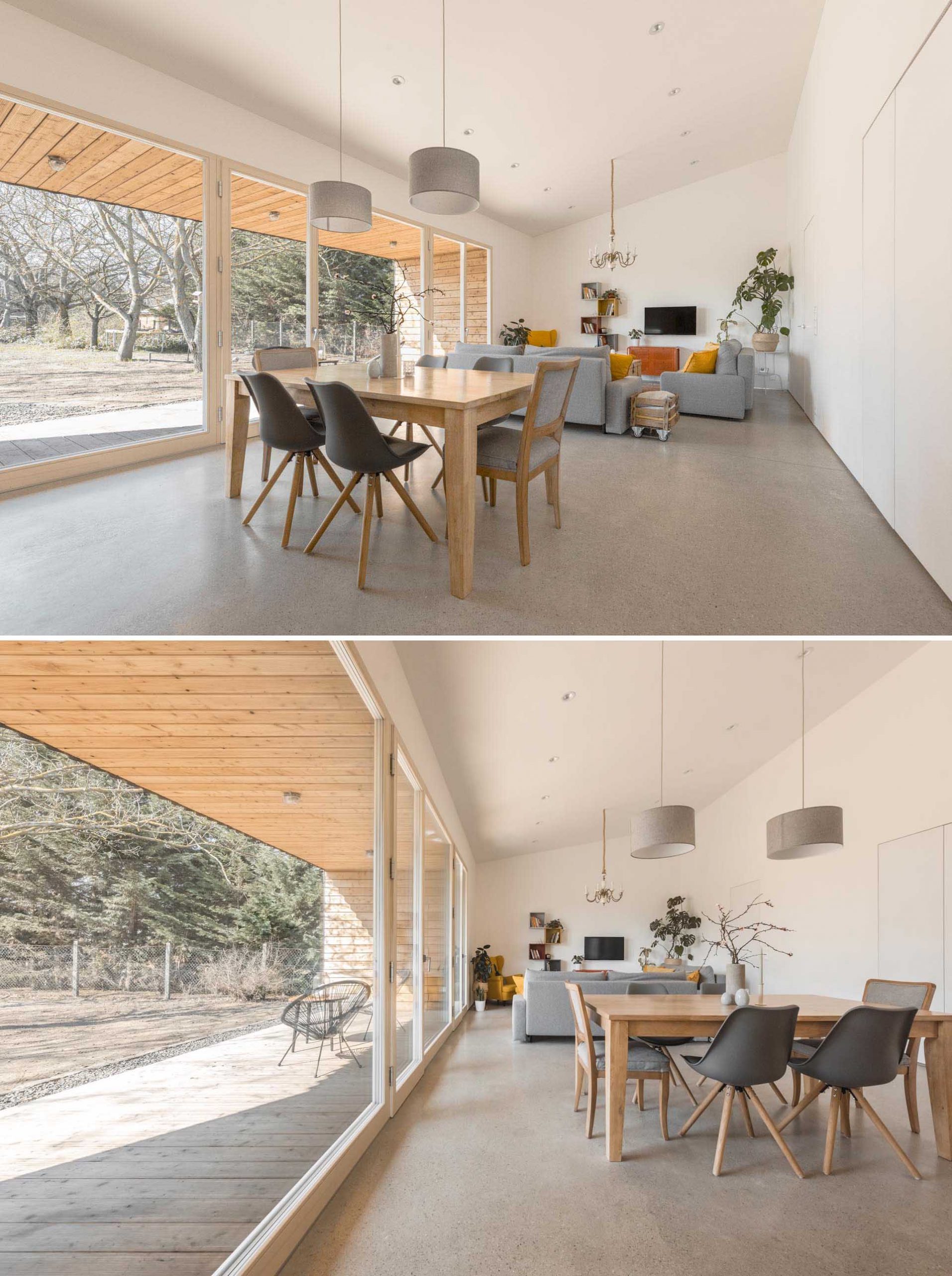 The interior of this modern home features simple white walls and a white ceiling, concrete floors, and a color palette of gray with yellow accents.