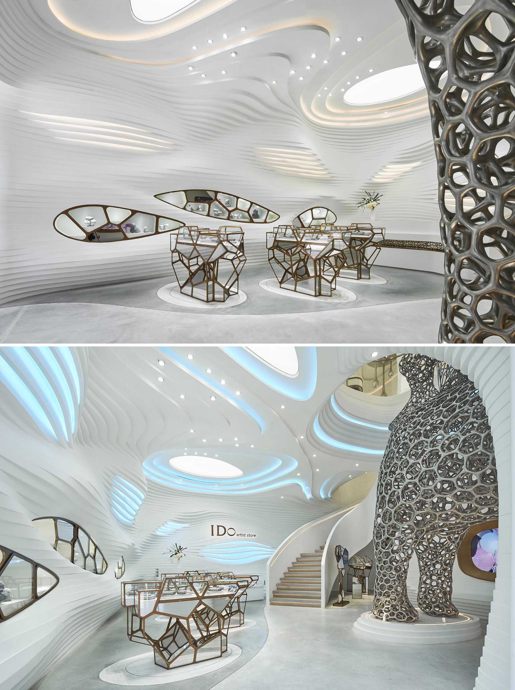 A modern retail store with an eye-catching facade, large sculptures, and a cave-like interior.