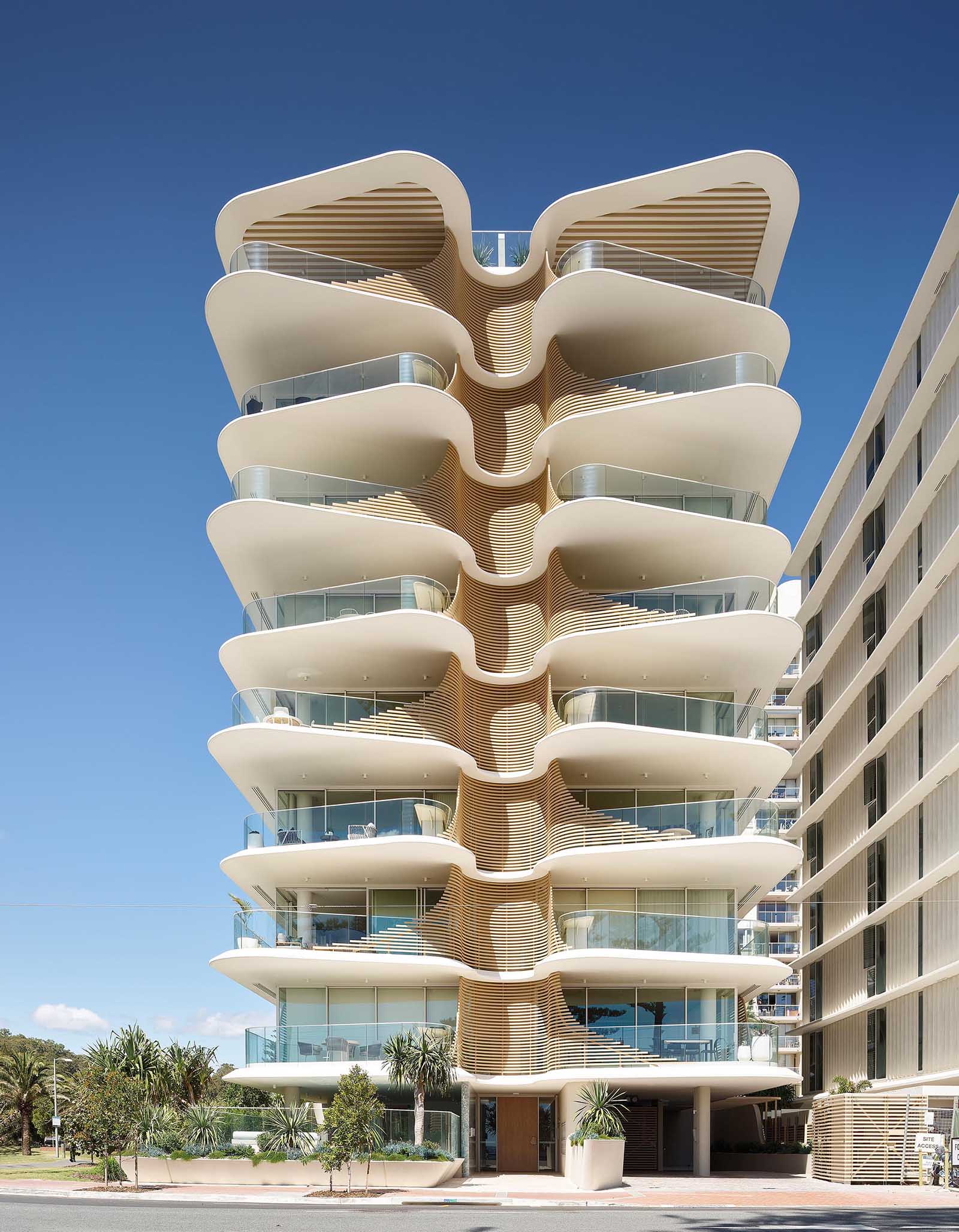 This sculptural and eye-catching building has organic, overlapping architectural curves that resemble the nearby heritage-listed Norfolk Pine Trees.