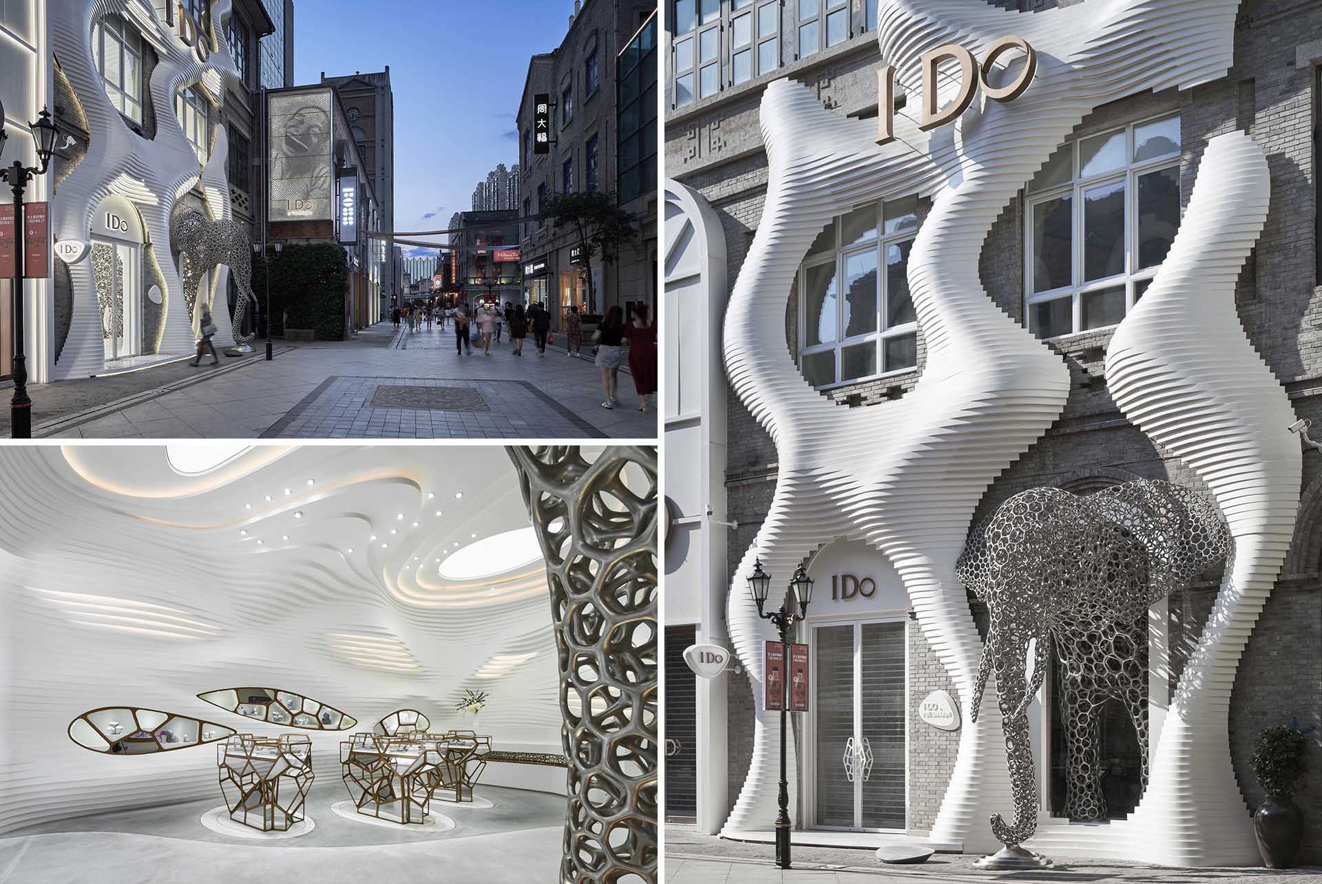 A modern retail store with an eye-catching facade, large sculptures, and a cave-like interior.