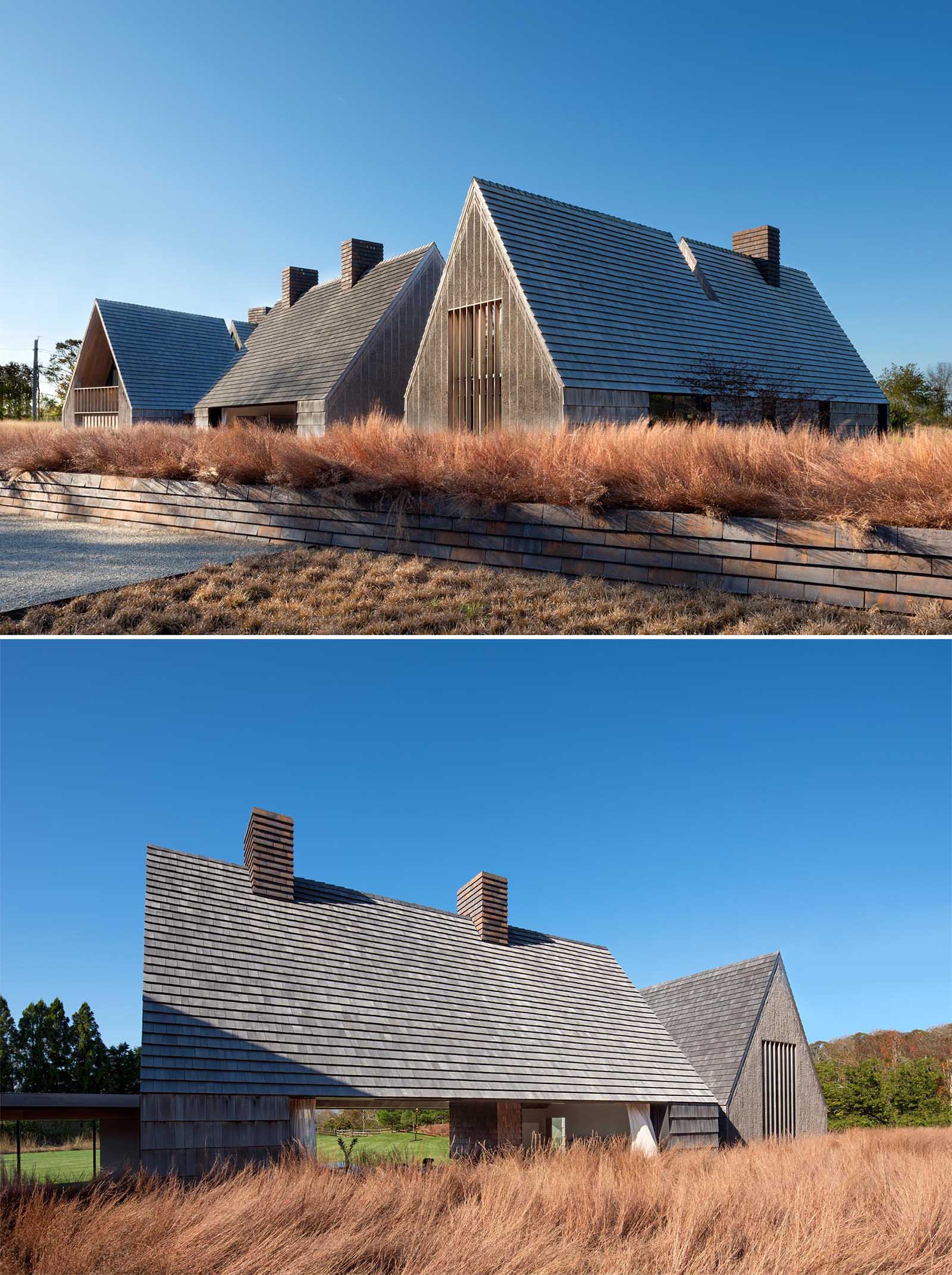 The weathered wood shingle siding that covers this modern home.