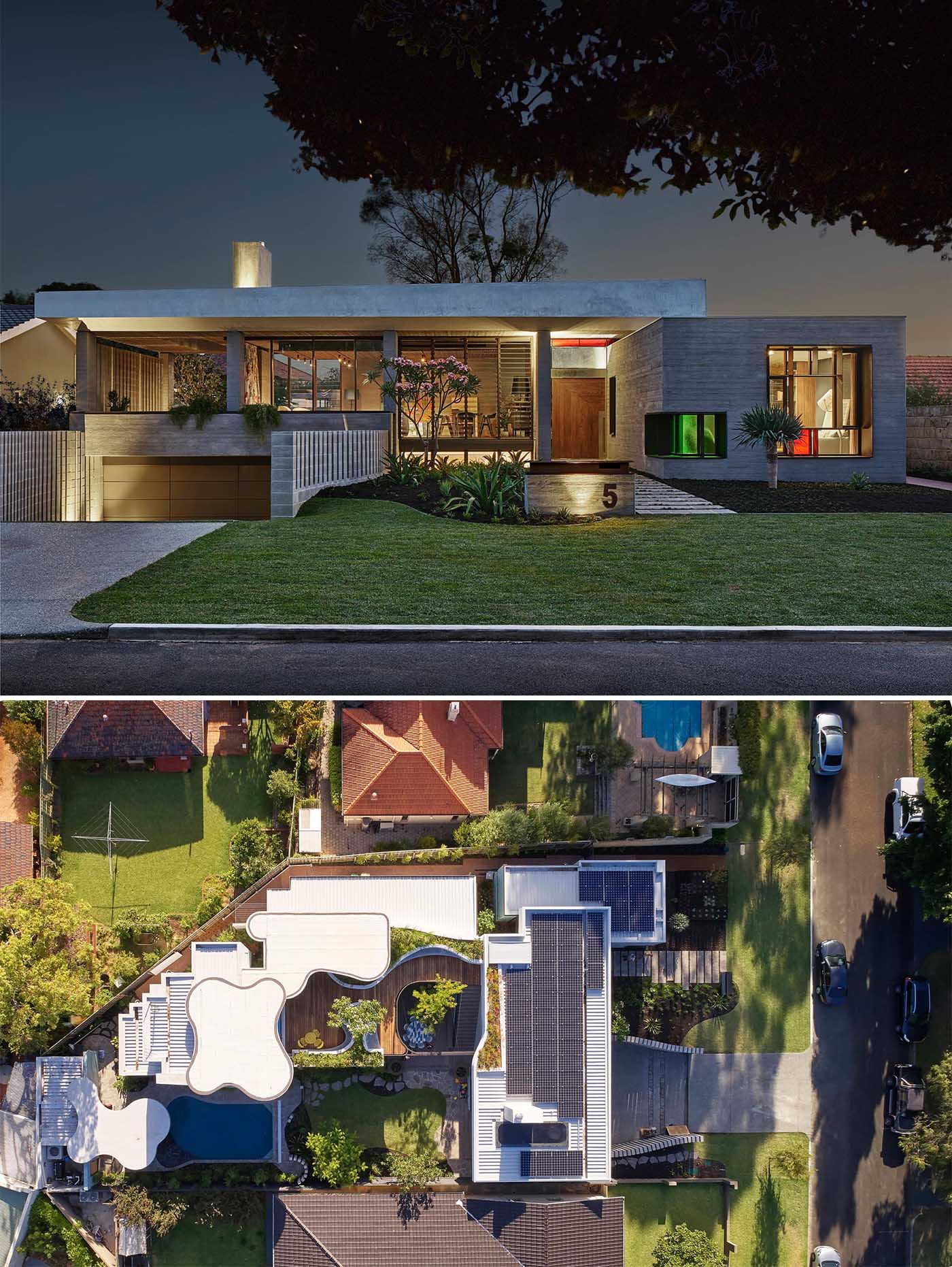 This modern two story house deliberately presents to the street looking like a single level house, with the board formed concrete immediately visible on the exterior. 