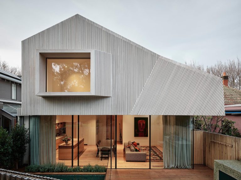 Angular Wood Slats And A Projecting Window Create A Unique Exterior Design For This Home Addition