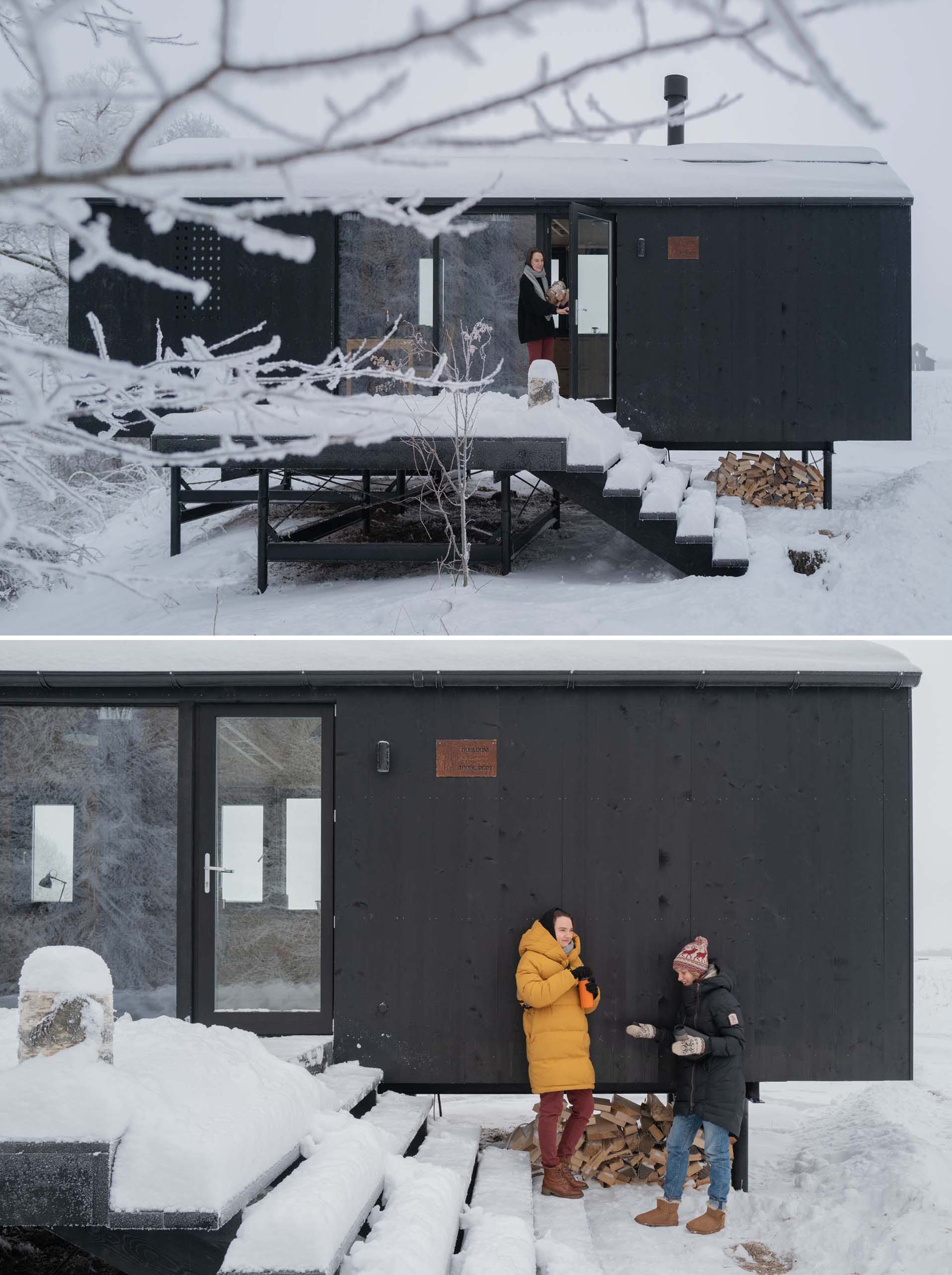 The exterior of this modular pre-fab home is made of black metal and wood.