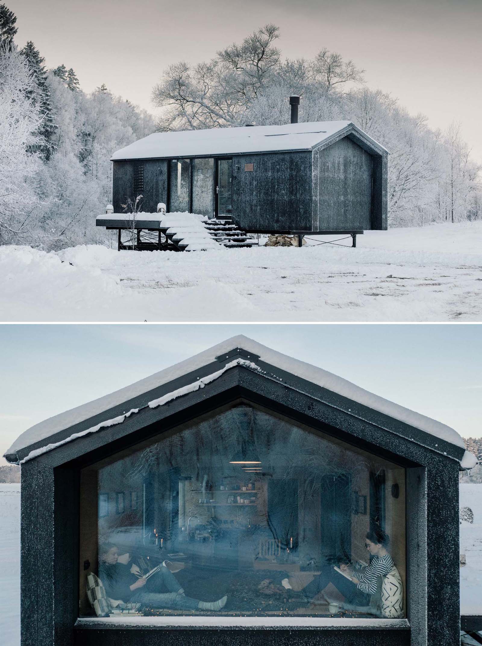 A modern and modular prefabricated home with a black exterior.