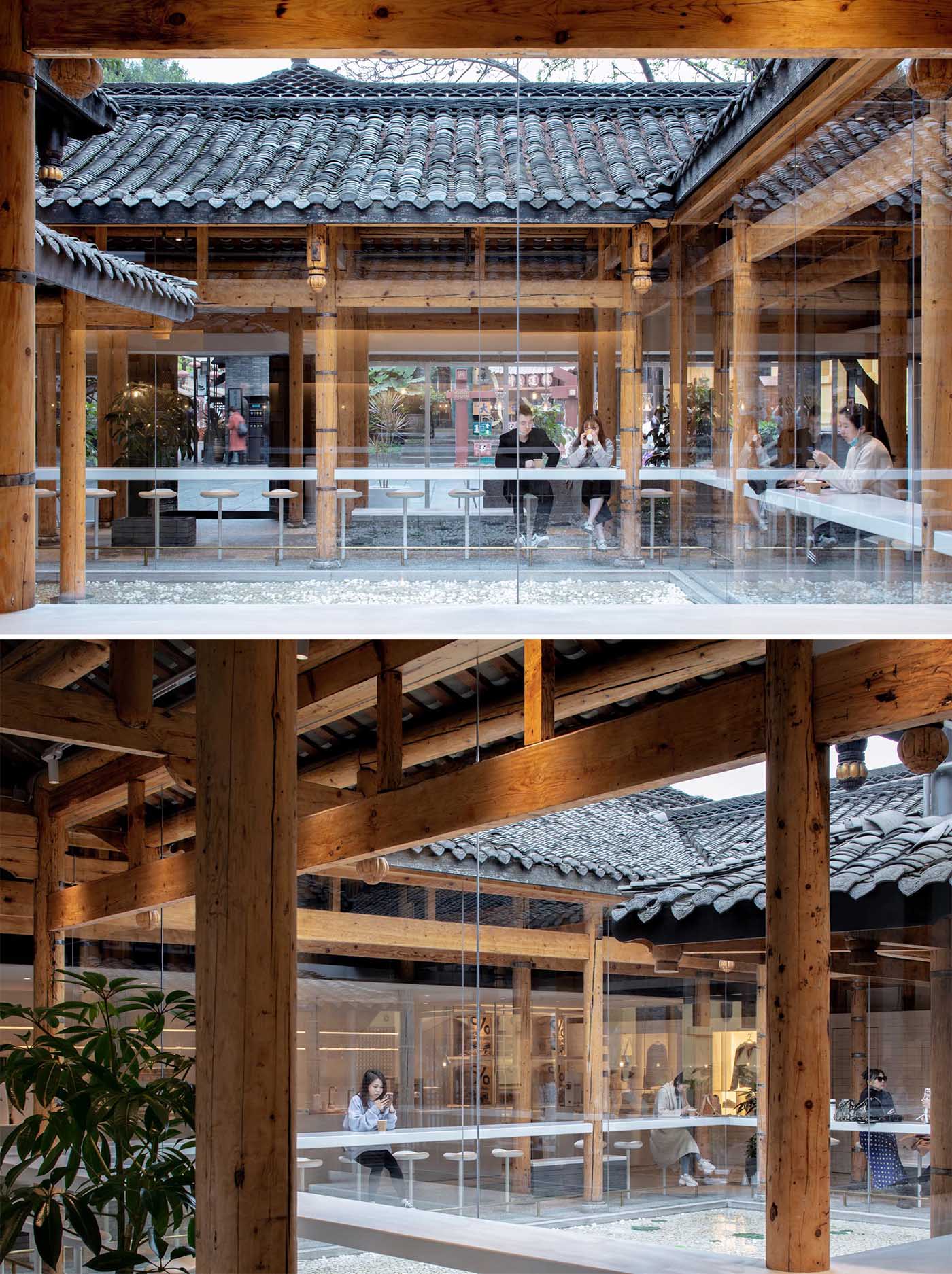Seating wraps around the glass walls, providing patrons a view of the courtyard.