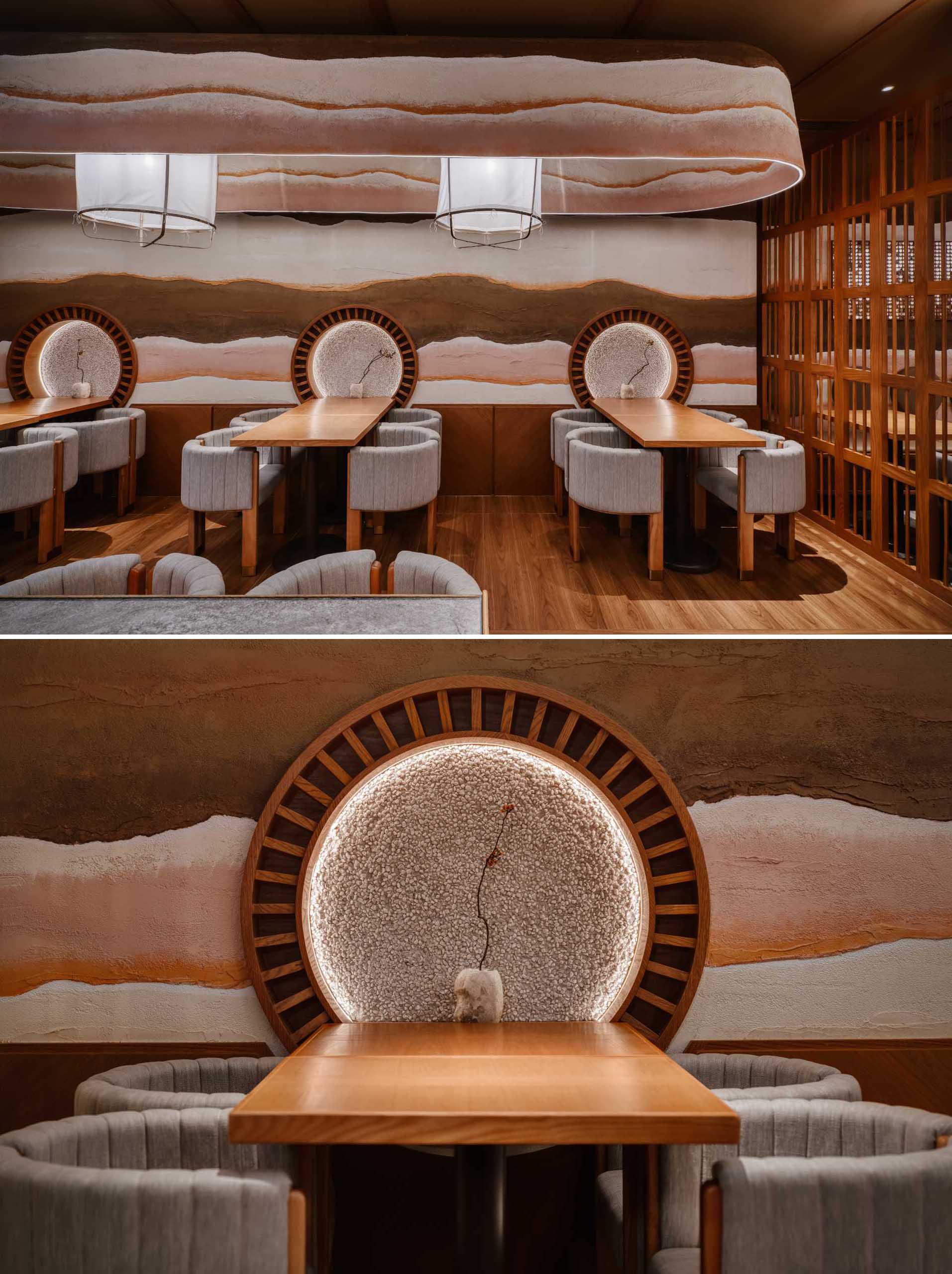 The dining area of this modern restaurant has been inspired by Japanese gardens, featuring ancient Japanese construction materials such as layered clay walls, mudball pebble, and timber.
