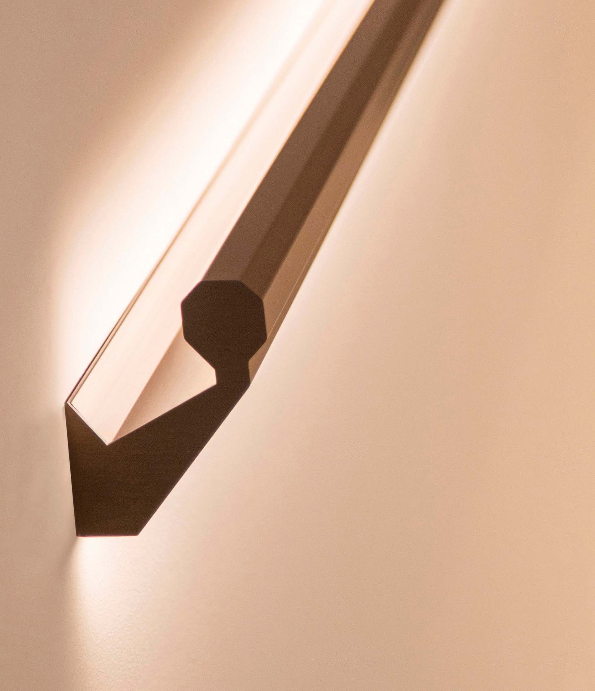 A minimalist handrail design that includes hidden LED lighting.