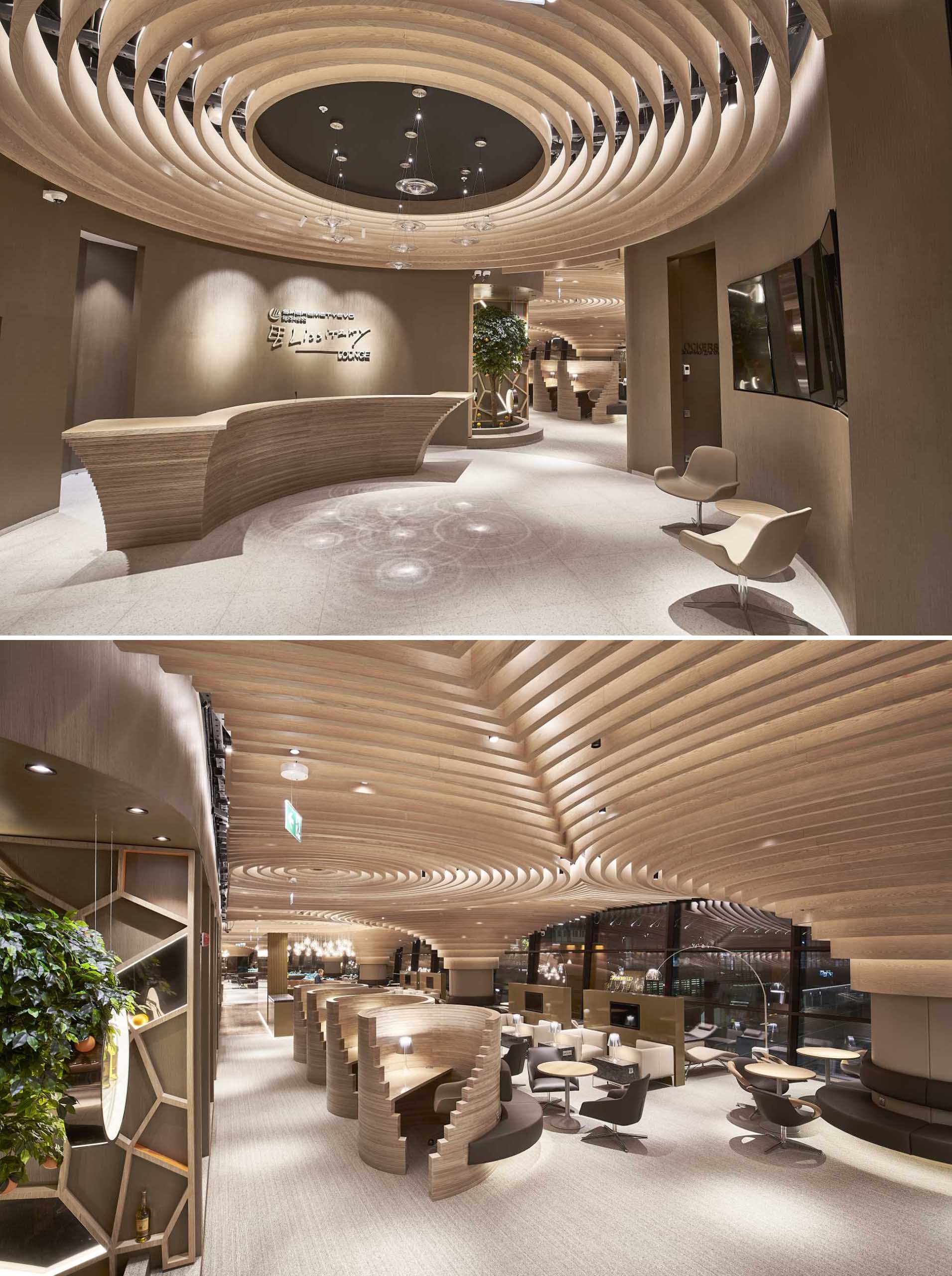 A modern airport lounge with circular wood design elements on the ceiling.