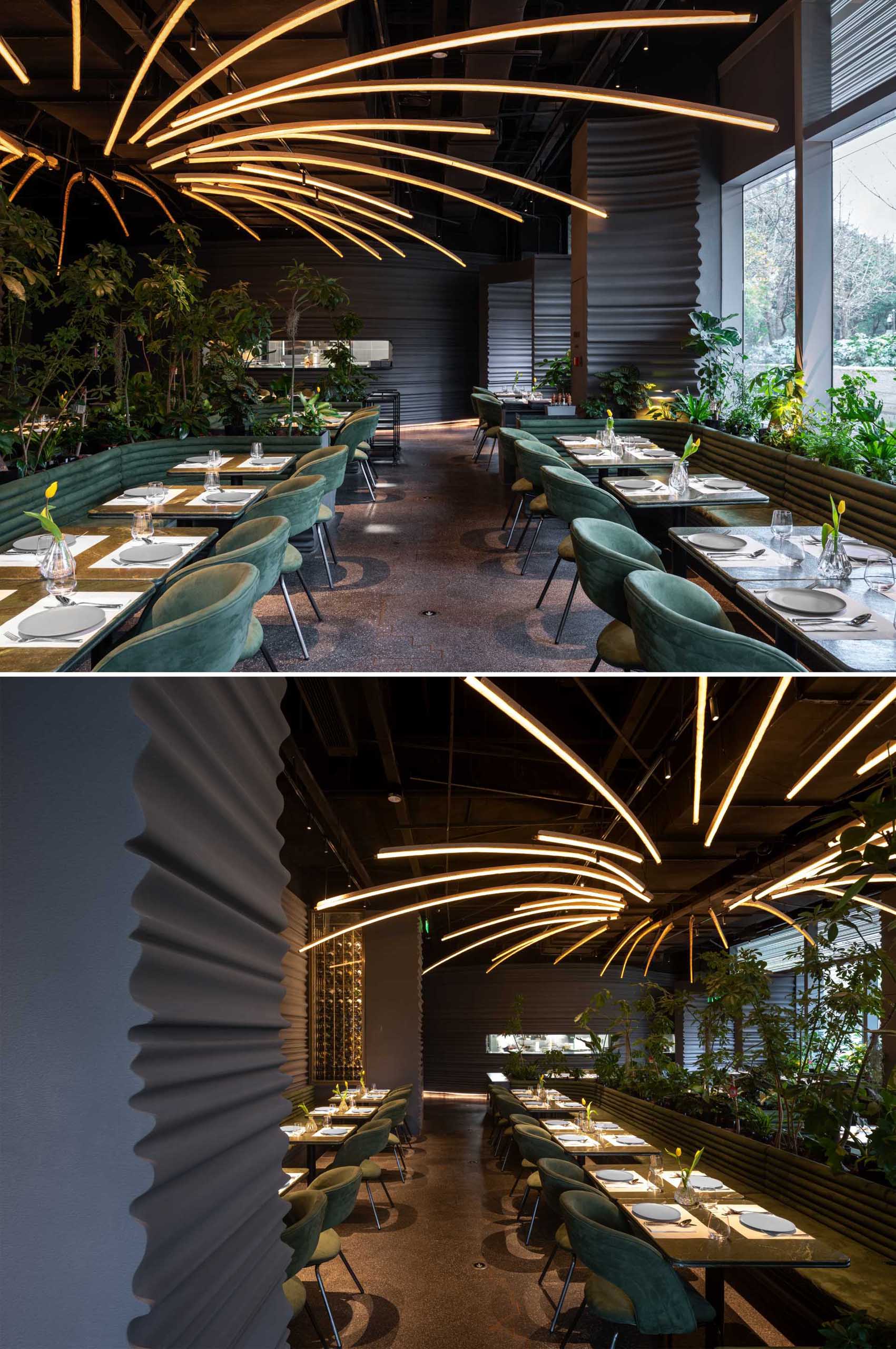 A modern restaurant with curved sculptural walls, and a lighting installation inspired by fire.