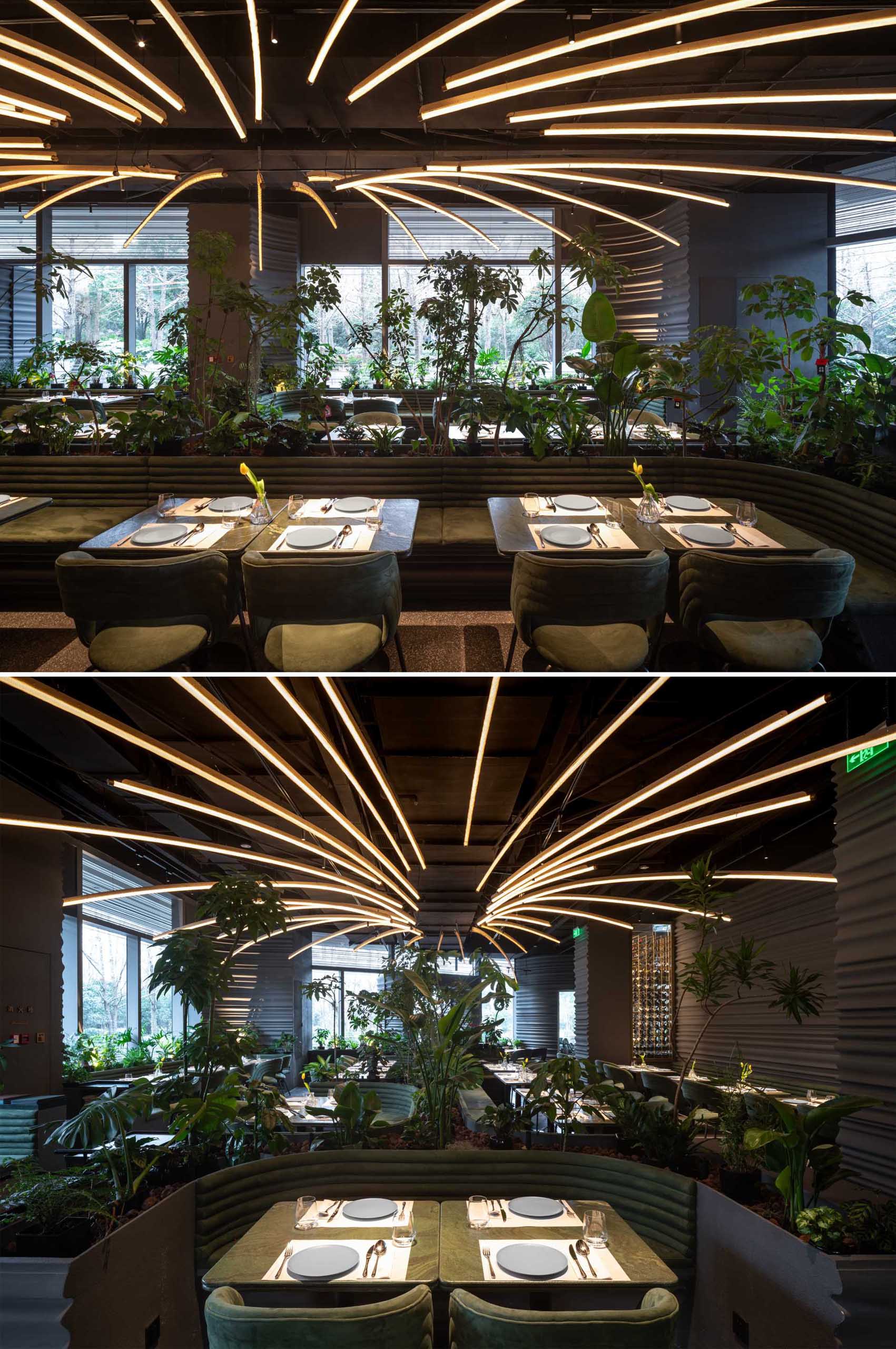 The large lighting installation above the main dining area of this modern restaurant was inspired by the sparkling embers of a firewood flame.