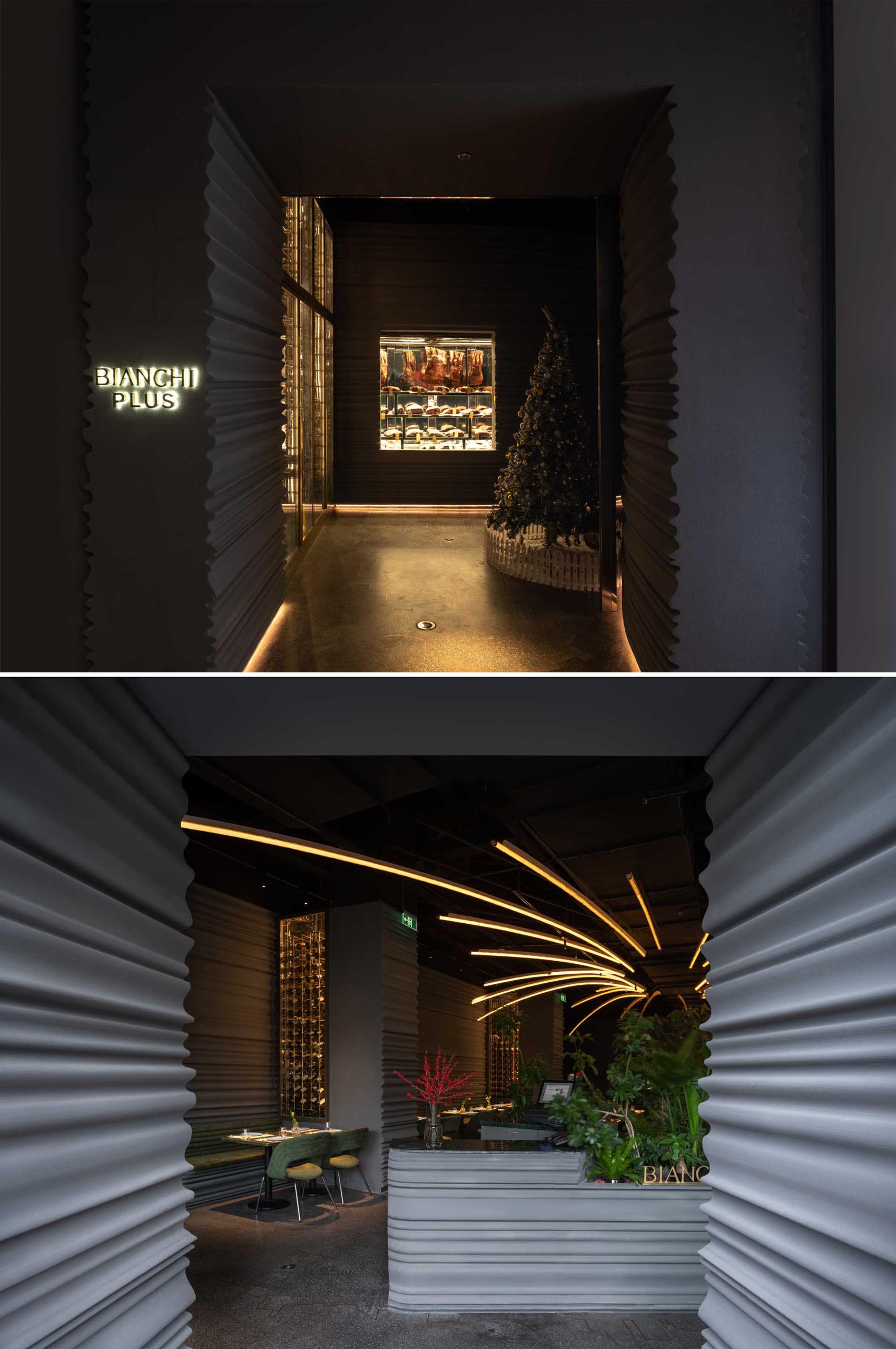 A modern restaurant interior with sculptural curved walls.