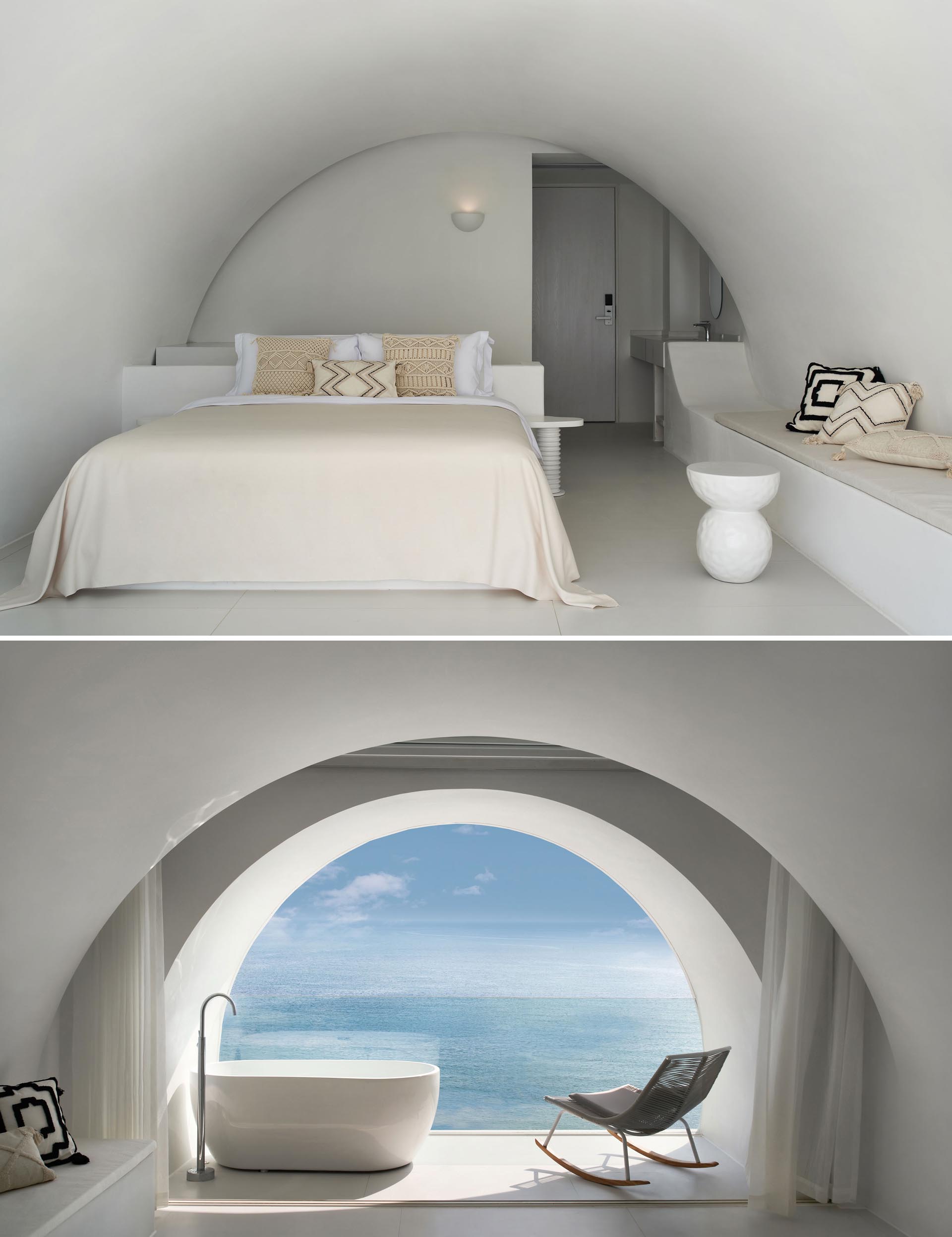 A modern while hotel room with an arched ceiling and bathtub by the window.