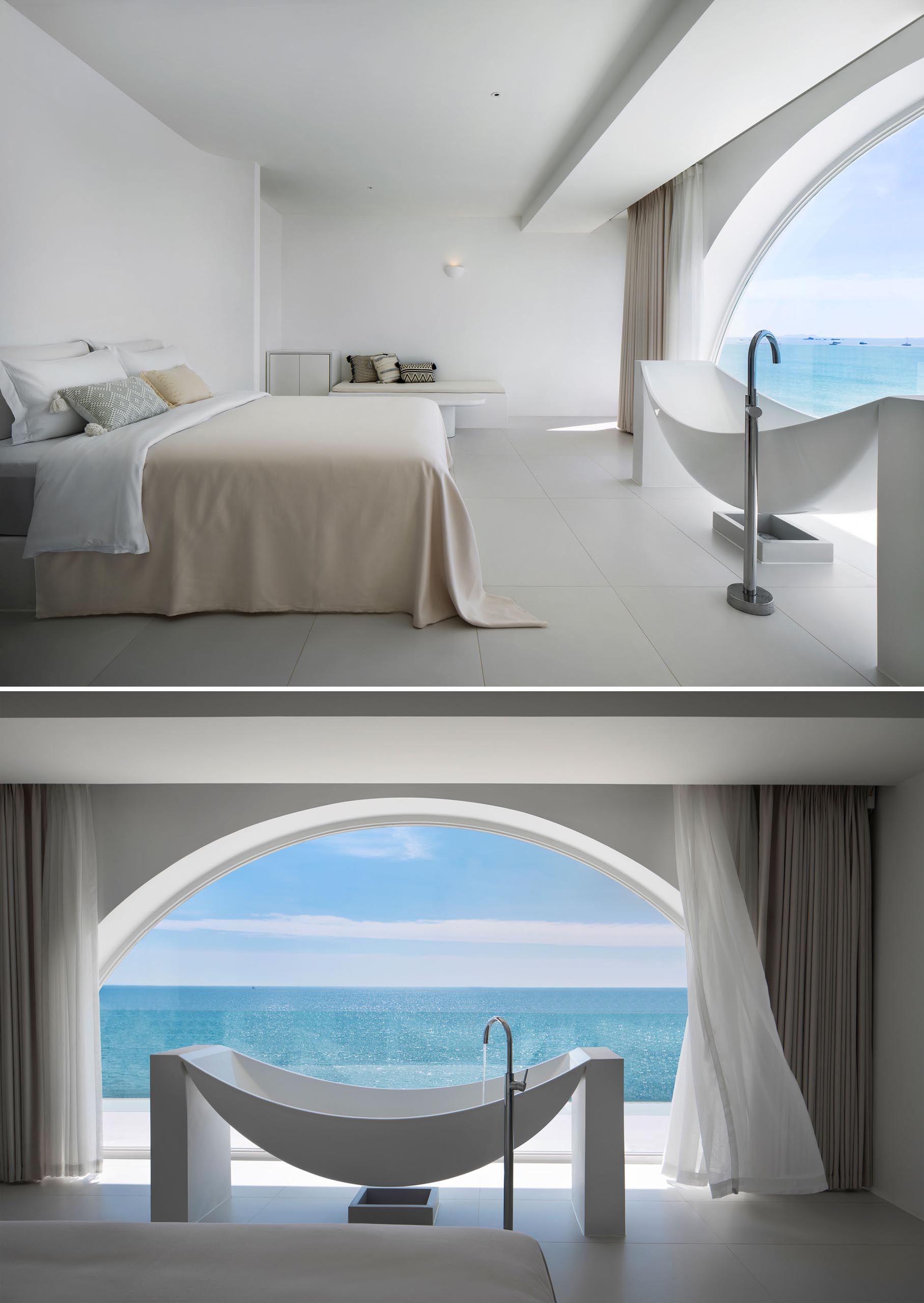 A modern while hotel room with a sculptural bathtub by the window.