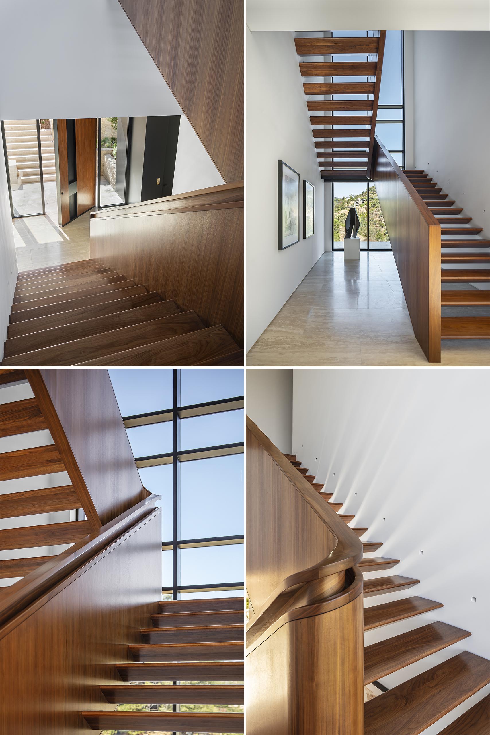 A modern wood staircase with built-in handrail.