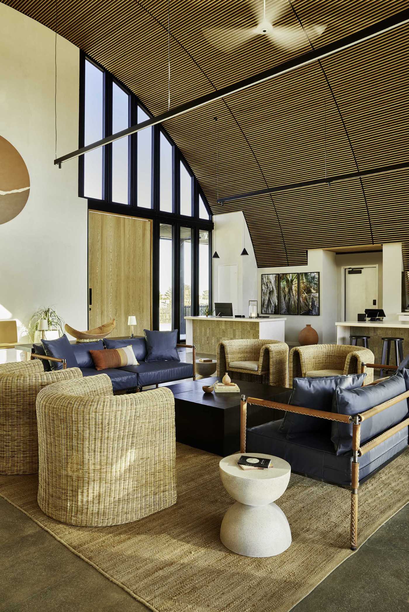 The interiors of this Clubhouse have been inspired by the golden hues and rough textures of the desert landscape. 