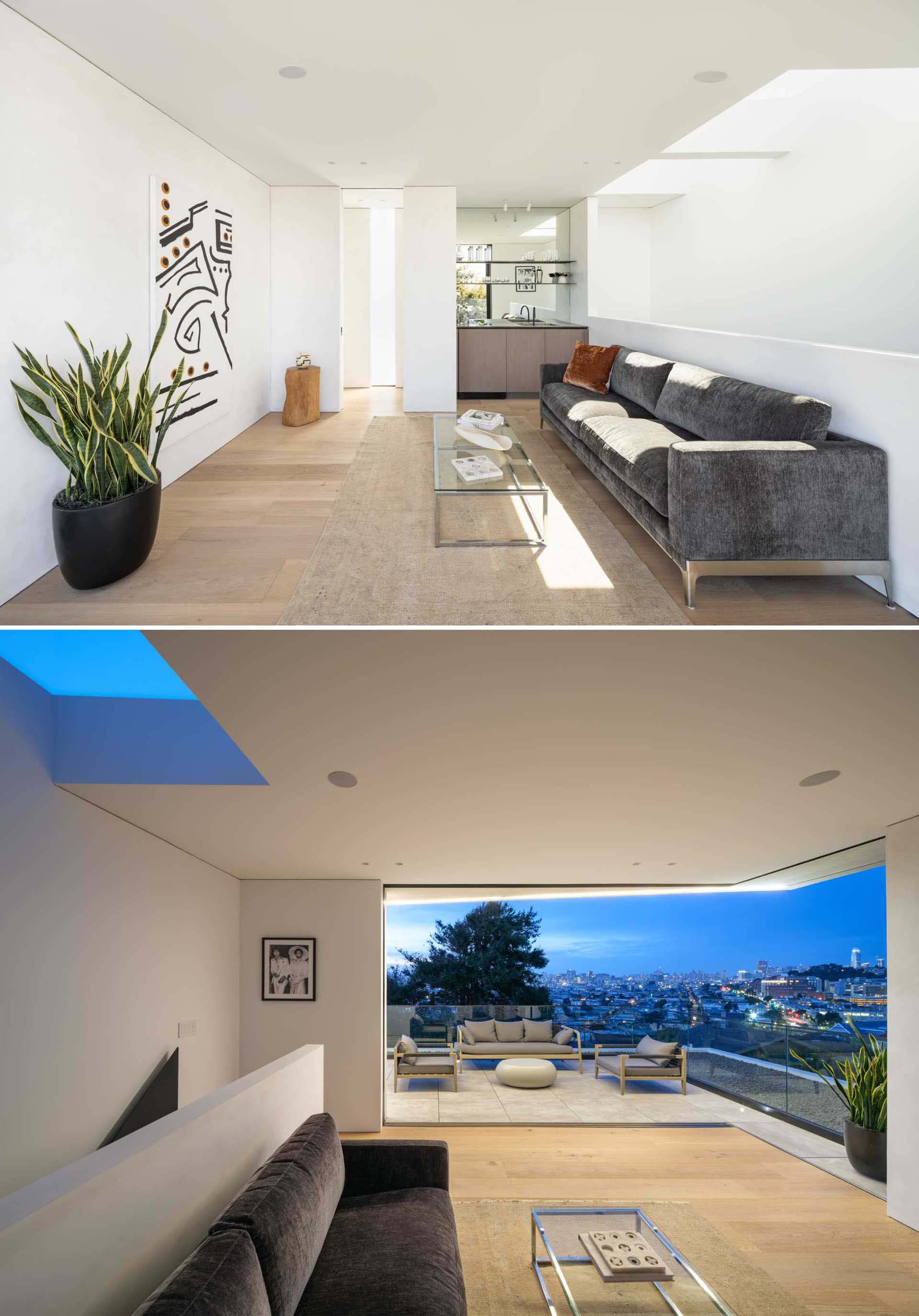 A modern living room with a bar and doors that open to a large balcony.