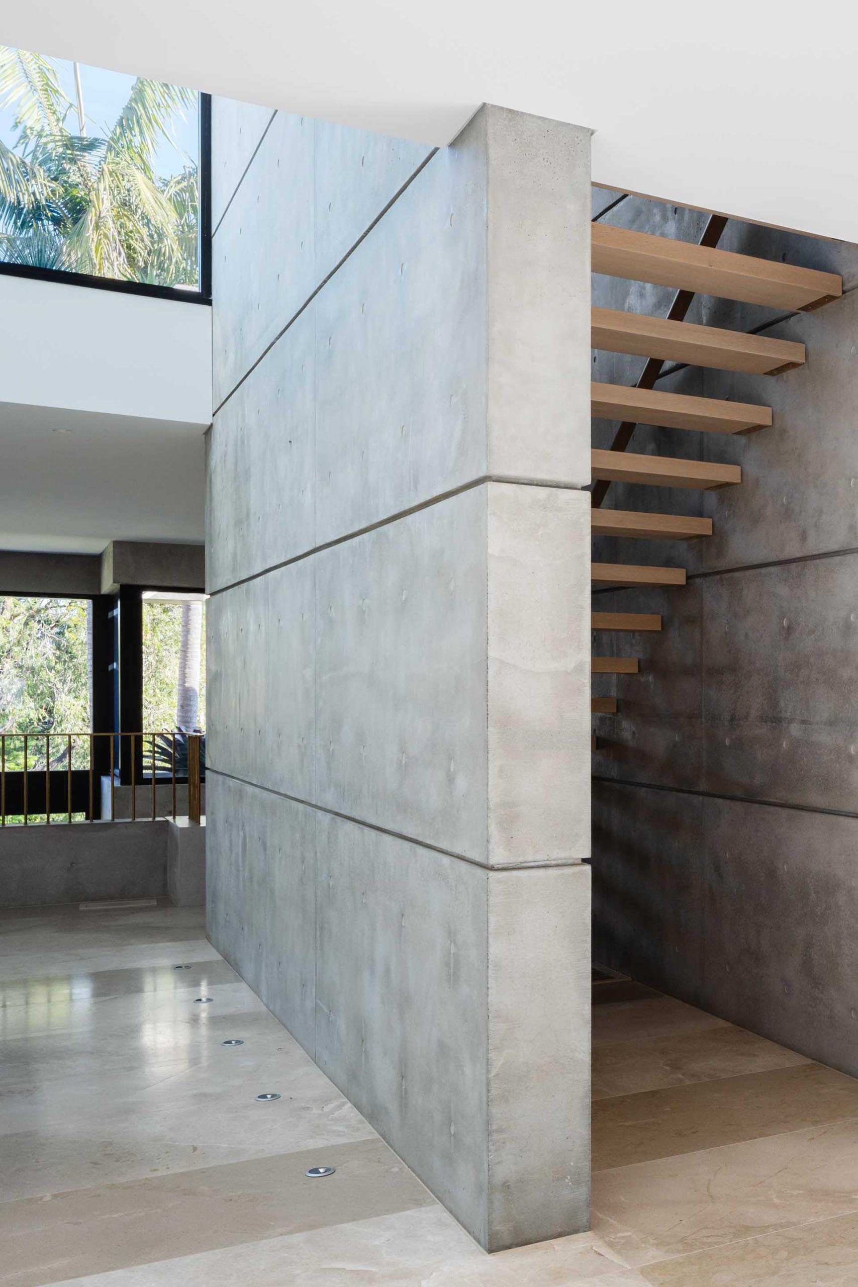 A modern house with thick concrete interior walls.