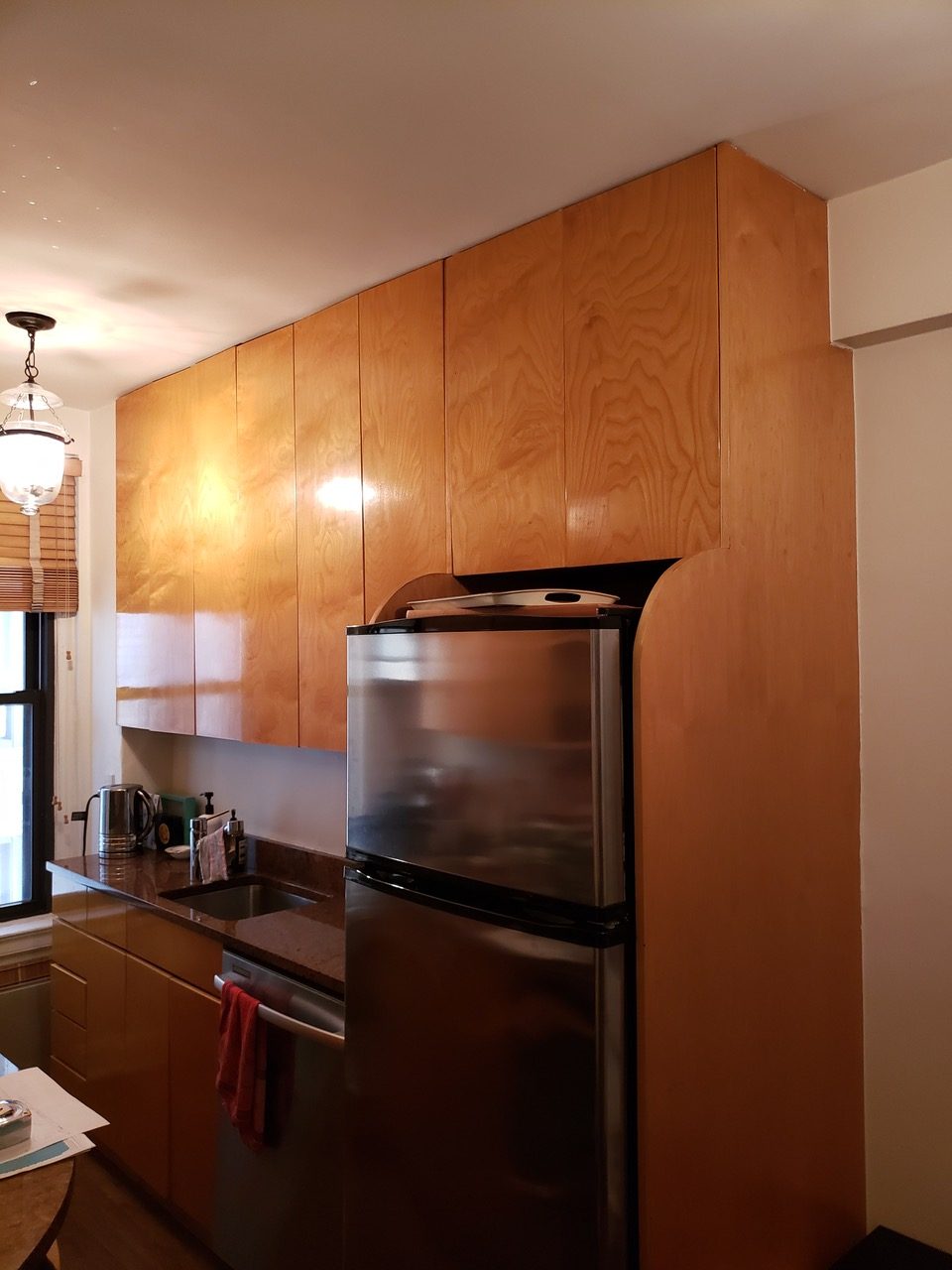 Before Photo - the remodel of a dated galley kitchen.