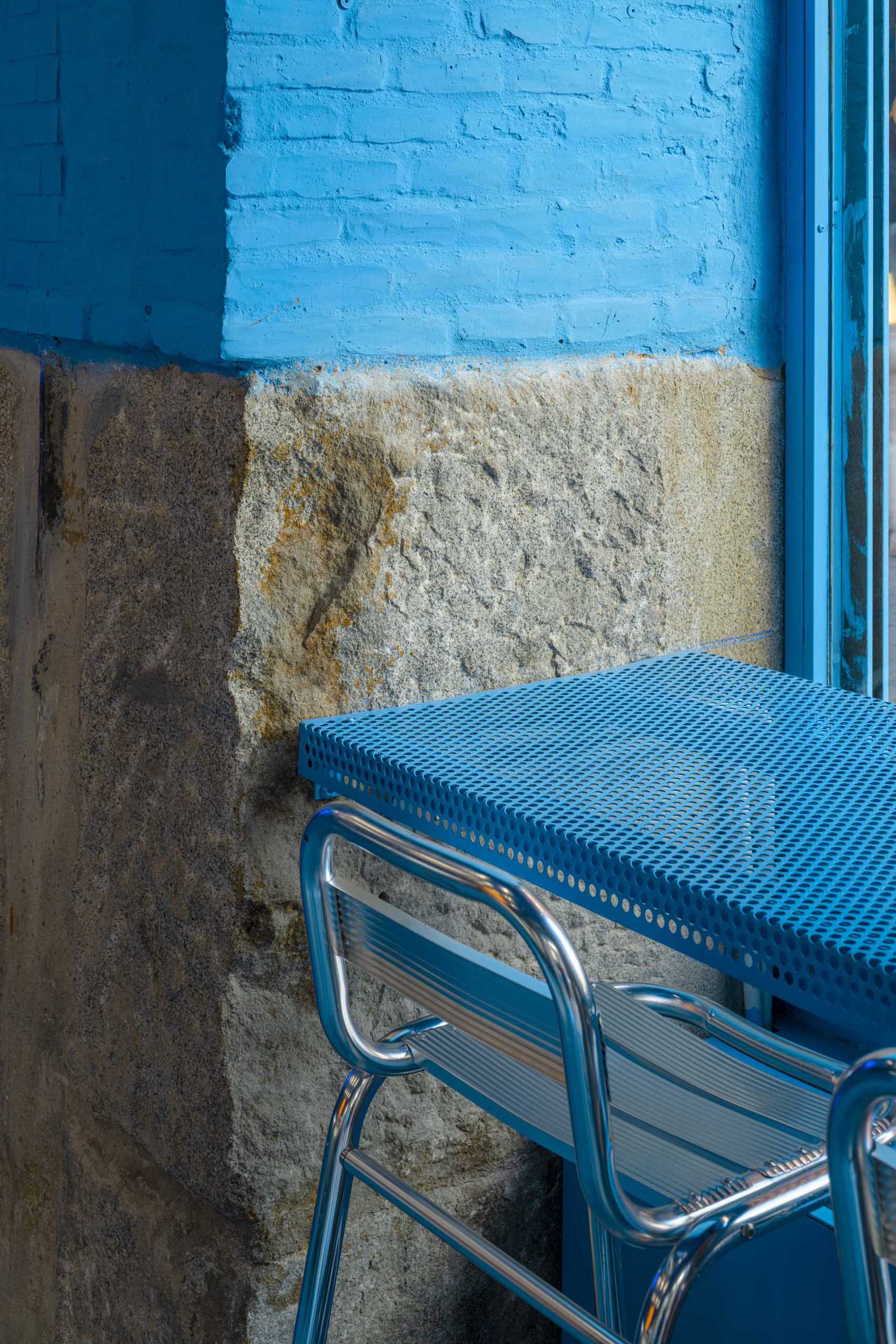 A modern blue ice cream shop in Spain.