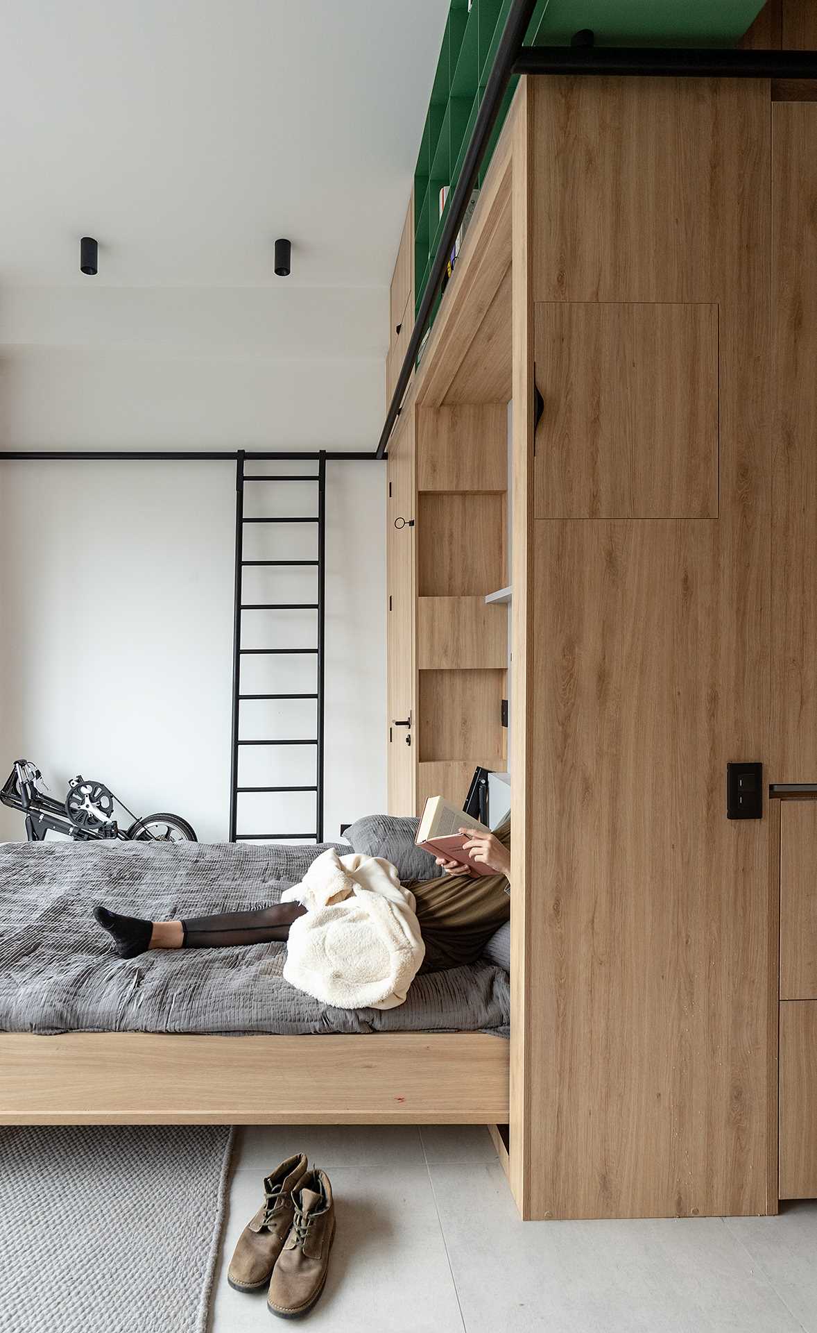 This studio apartment includes a variety of hidden features, like a fold down bed.