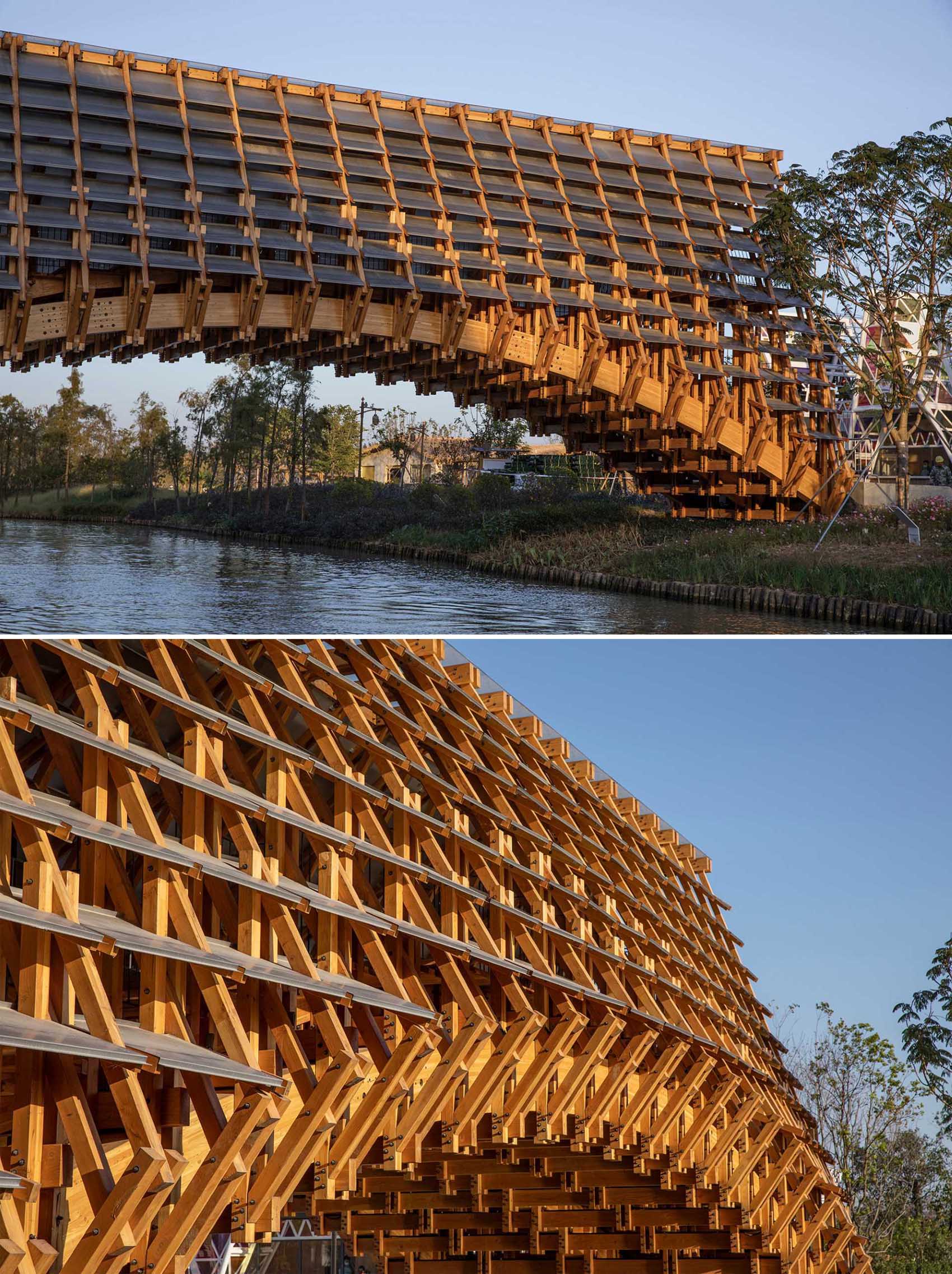 A modern pedestrian bridge made from wood, metal, and glass.