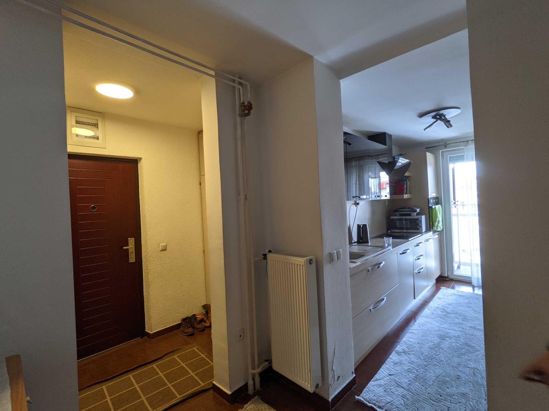 BEFORE - A dated 1960's apartment kitchen was completely gutted before being transformed into an apartment full of color.