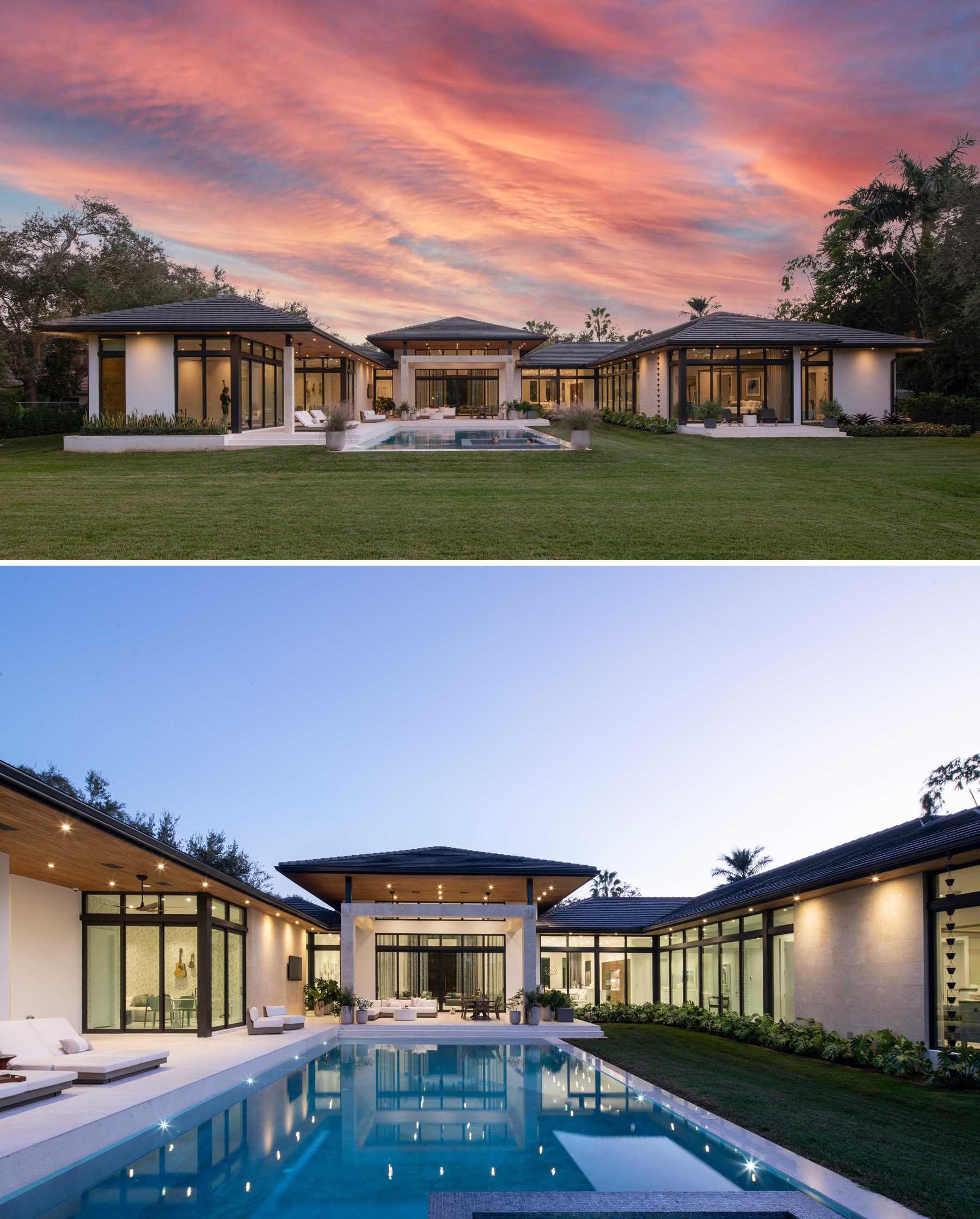 The rear of this contemporary home shows the U-shape design, with the bedrooms and social areas all having views of the swimming pool through floor-to-ceiling windows.