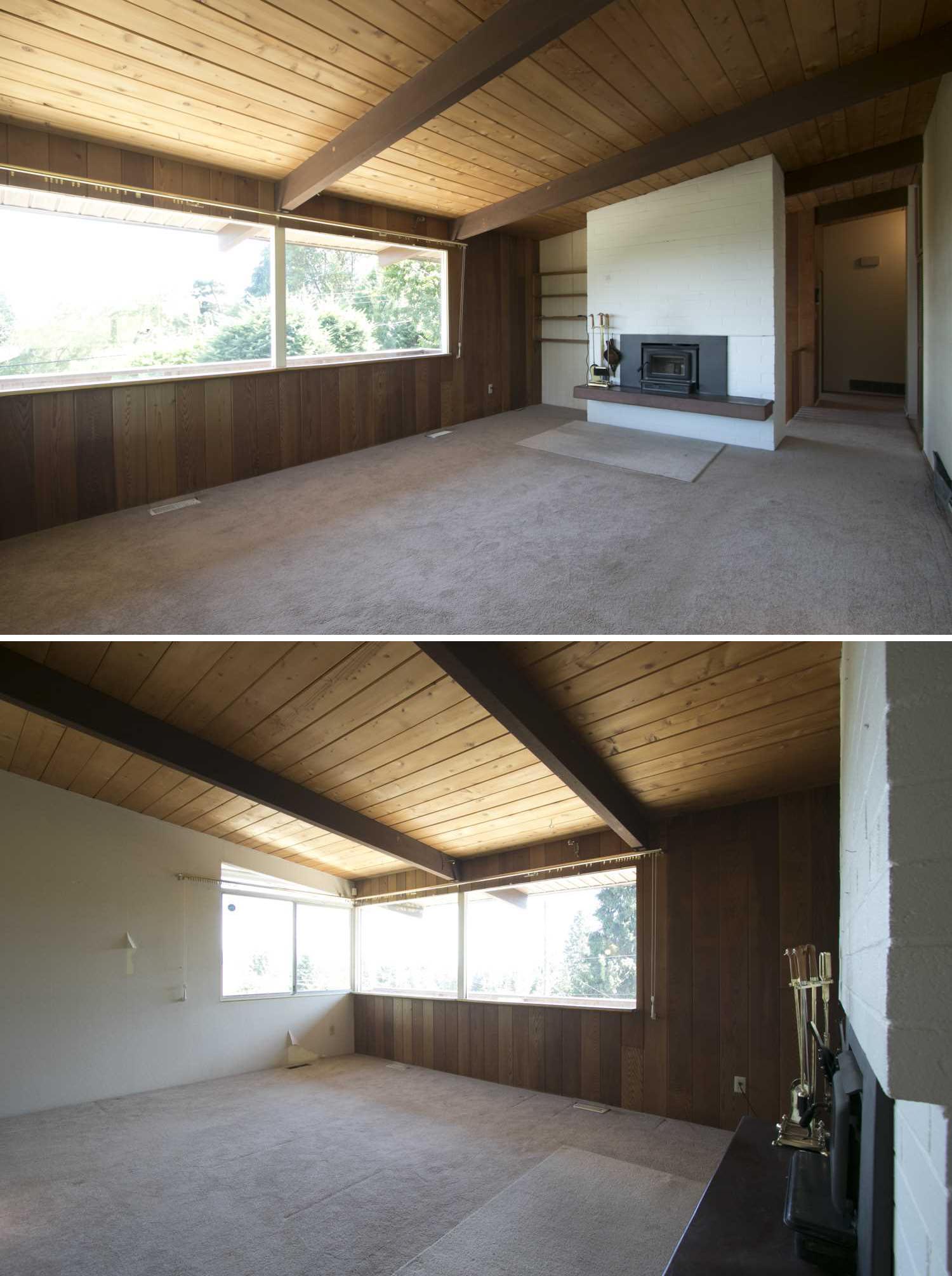 BEFORE - The original living room includes wood paneled walls, while carpet covered the floor.